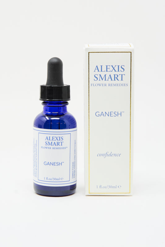 A blue glass dropper bottle labeled "Alexis Smart Flower Remedies - Ganesh" appears next to its box reading "Ganesh confidence," featuring organic flower essences for powerful confidence support.