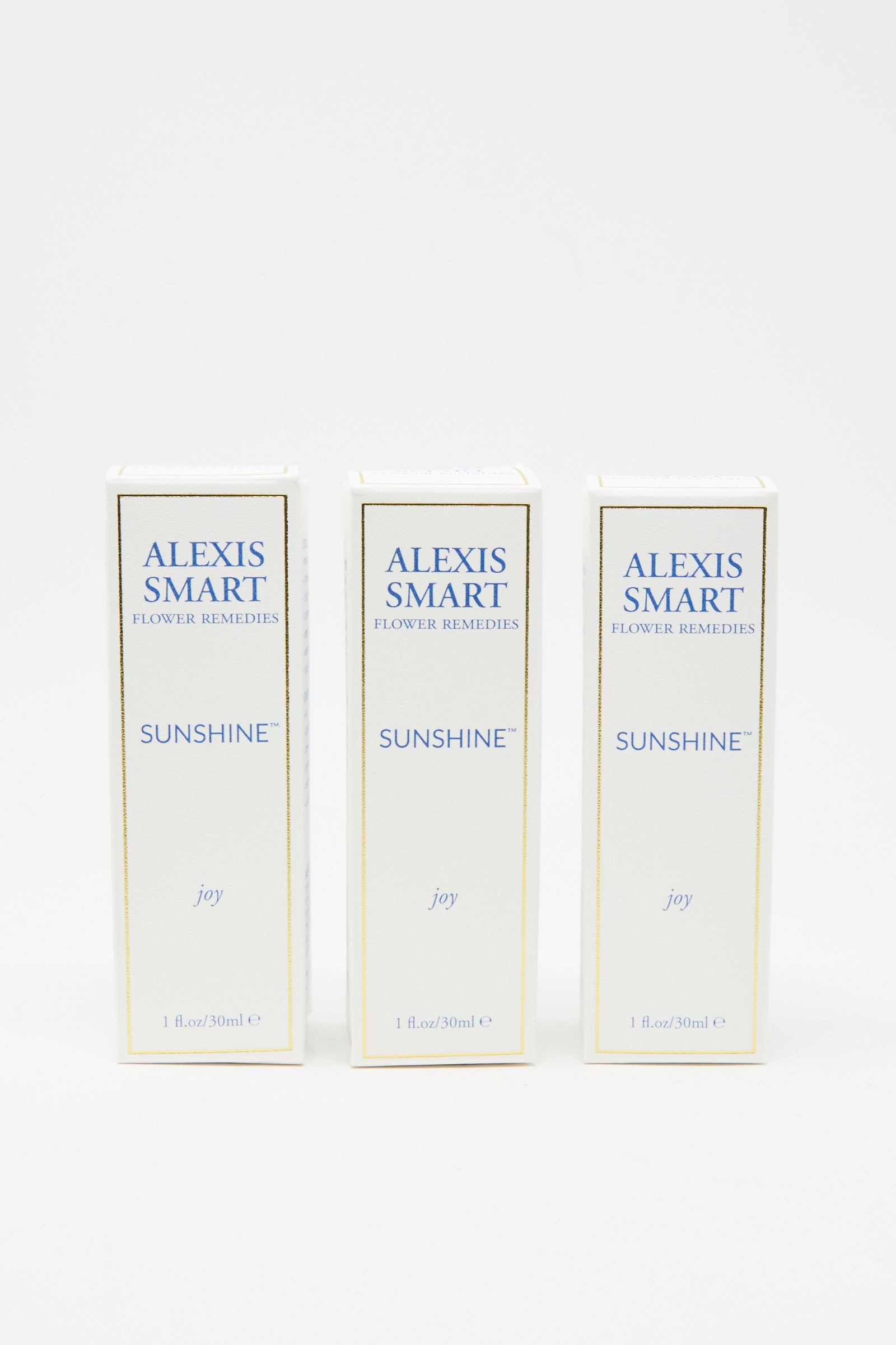 Three boxes of Alexis Smart Flower Remedies - Sunshine, each with 1 fl oz (30 ml) of organic flower essences, are arranged side by side against a white background.