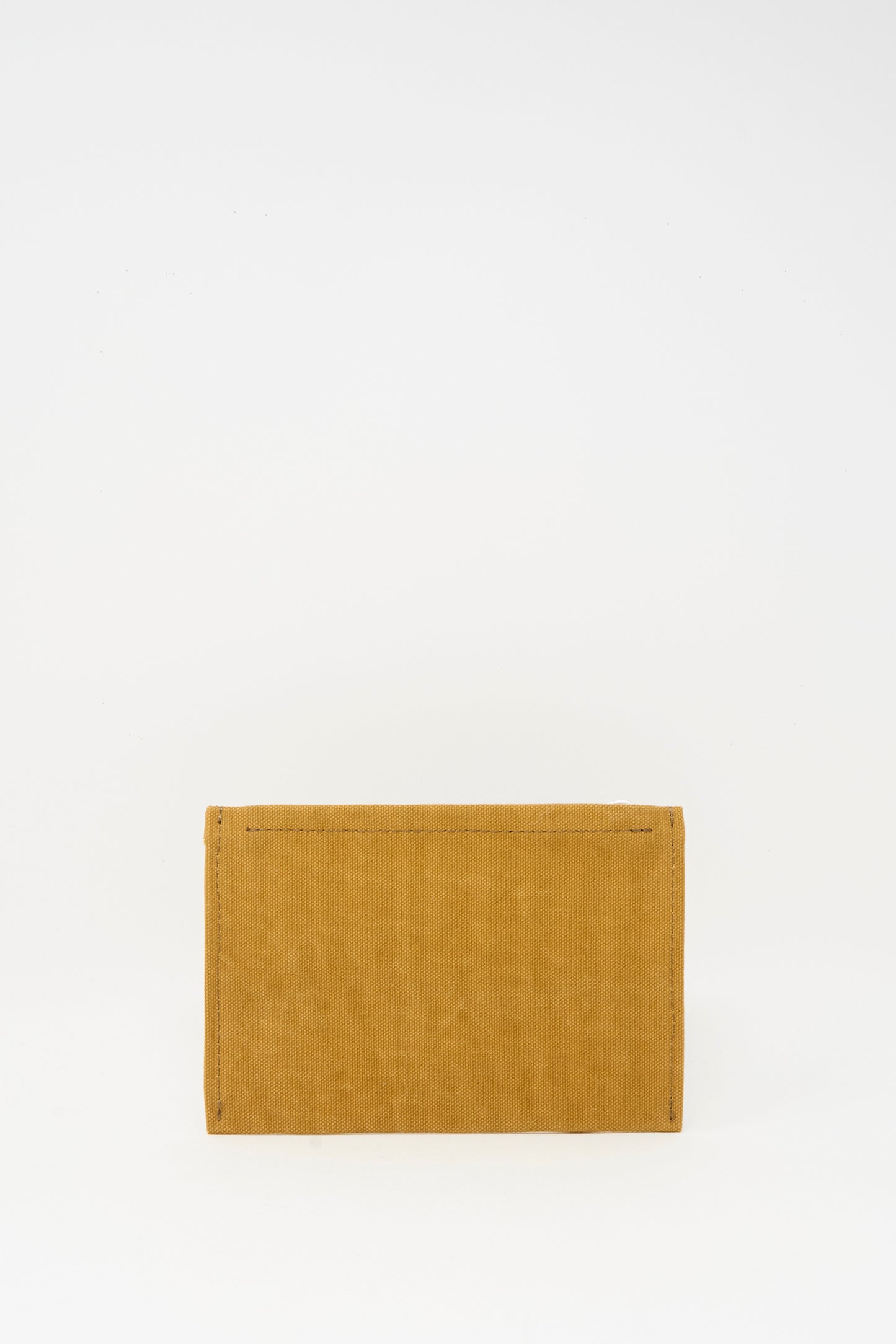 The Amiacalva Washed Canvas Medium Pouch in Mustard is shown upright against a plain white background.
