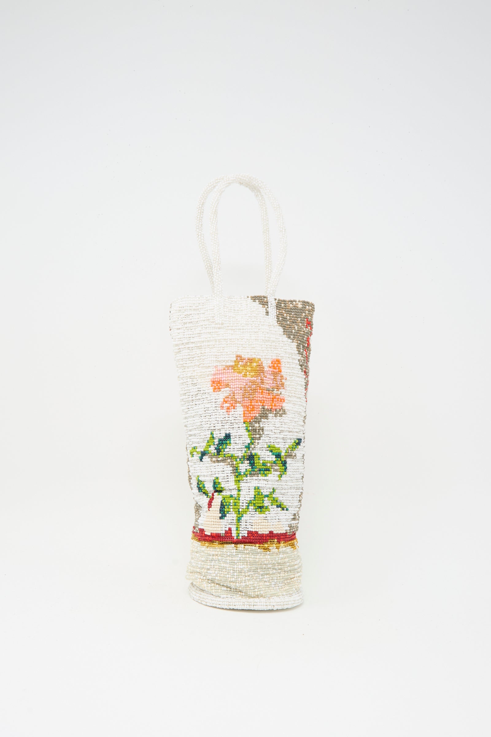 The Cordera Beaded Bag in Fiore is a handcrafted accessory with handles, featuring a vibrant orange flower and green leaves on a white background, made in Guatemala.