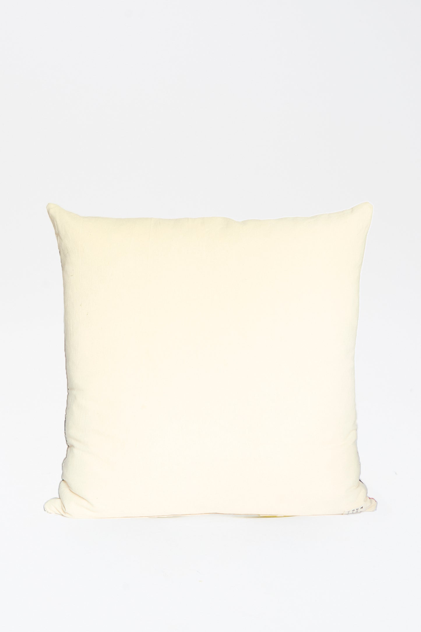 The Counterpane Patchwork Pillow (28" x 28") in Pink and Multi II is shown against a white background.
