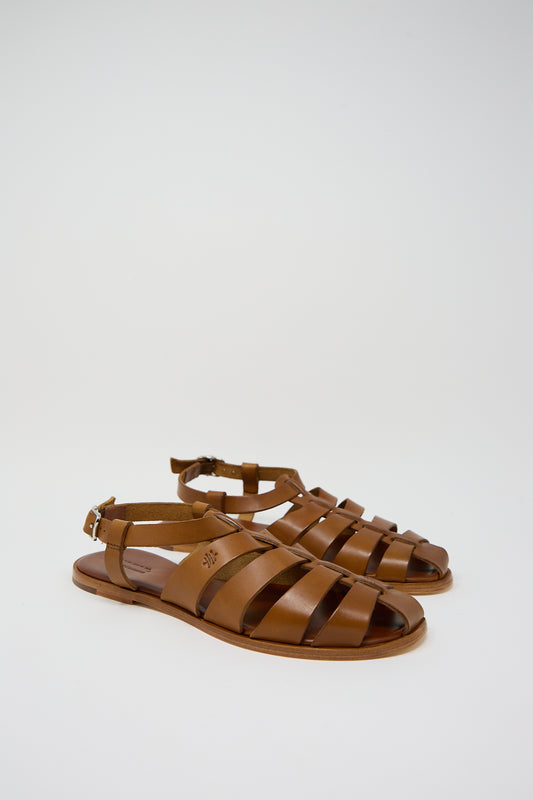 A pair of Dragon Diffusion Pescador Sandal in Tan on a white background.