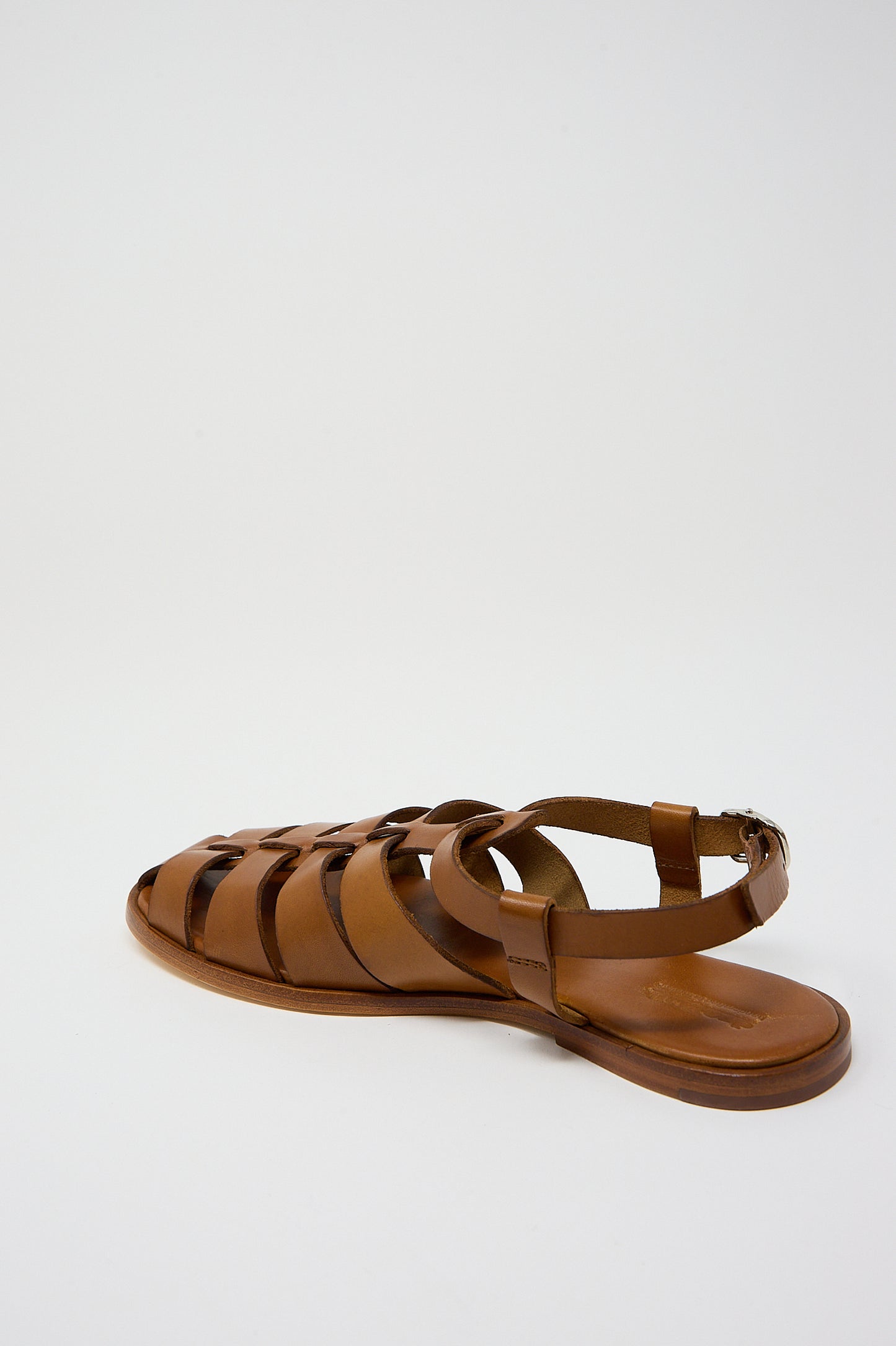 A pair of Dragon Diffusion Pescador Sandals in Tan placed on a white background.