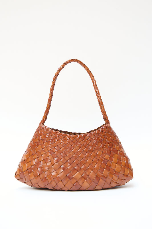 A brown woven buffalo leather handbag with a braided strap, displayed against a white background. 
Product Name: Rosanna in Tan
Brand Name: Dragon Diffusion