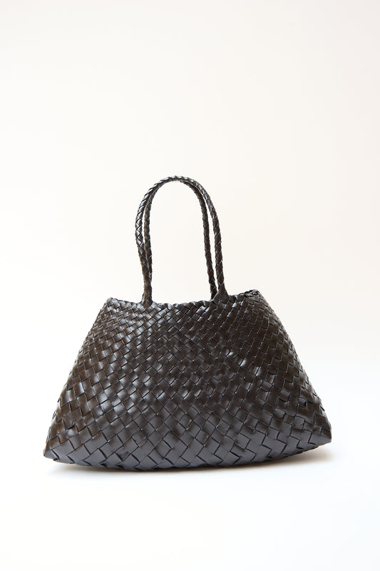 A Santa Croce Big handwoven leather tote bag in Black with two handles, displayed against a plain white background by Dragon Diffusion.