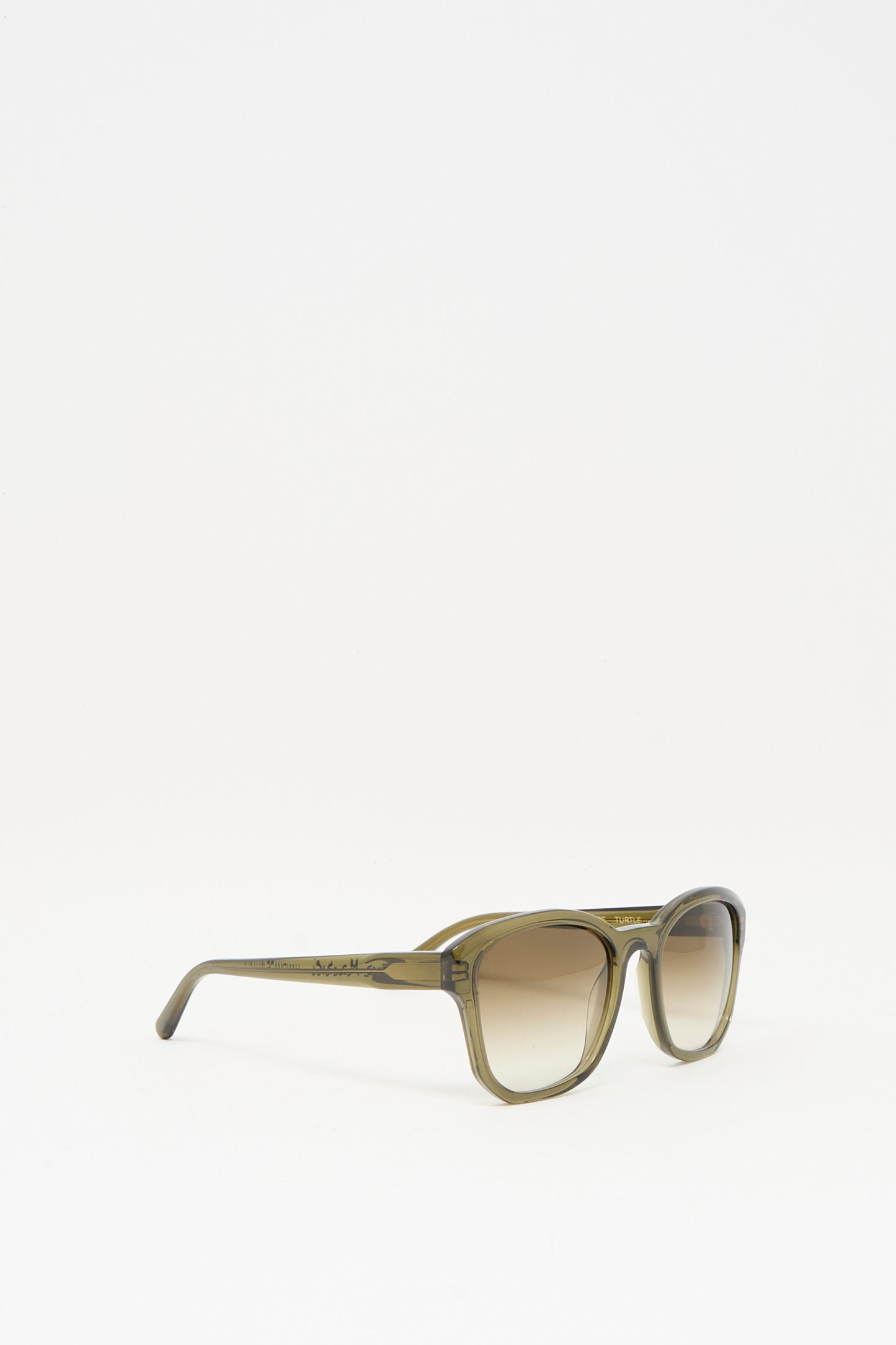 The BQE Sunglasses in Turtle by Eva Masaki feature square frames crafted from premium Mazzucchelli acetate and gradient Zeiss lenses, shown against a plain white background.