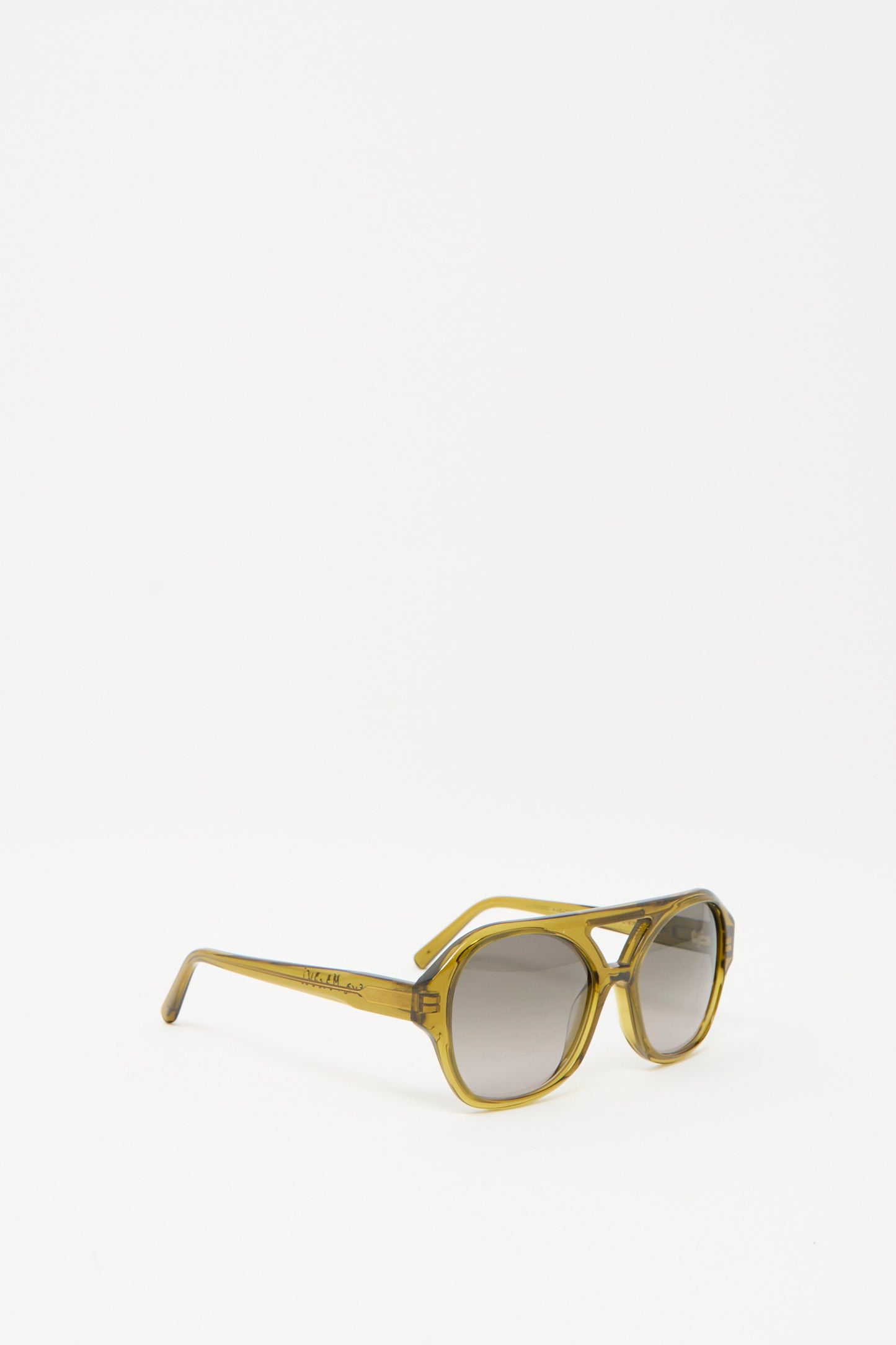 Chiyo Aviator Sunglasses in Avocado by Eva Masaki feature Italian acetate rectangular frames with dark lenses against a plain white background, offering premium UV protection.