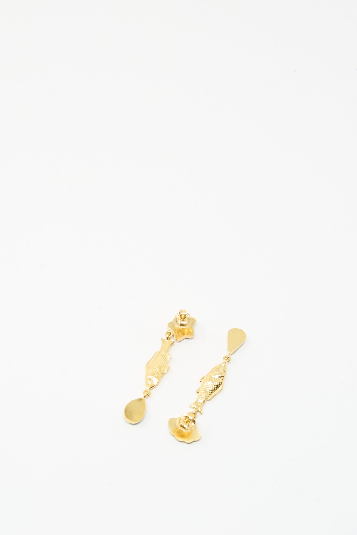 Grainne Morton Fish and Vintage Cabochon Drop Earrings, featuring mismatched fish shapes crafted from 18K gold plated silver, are displayed on a plain white background.