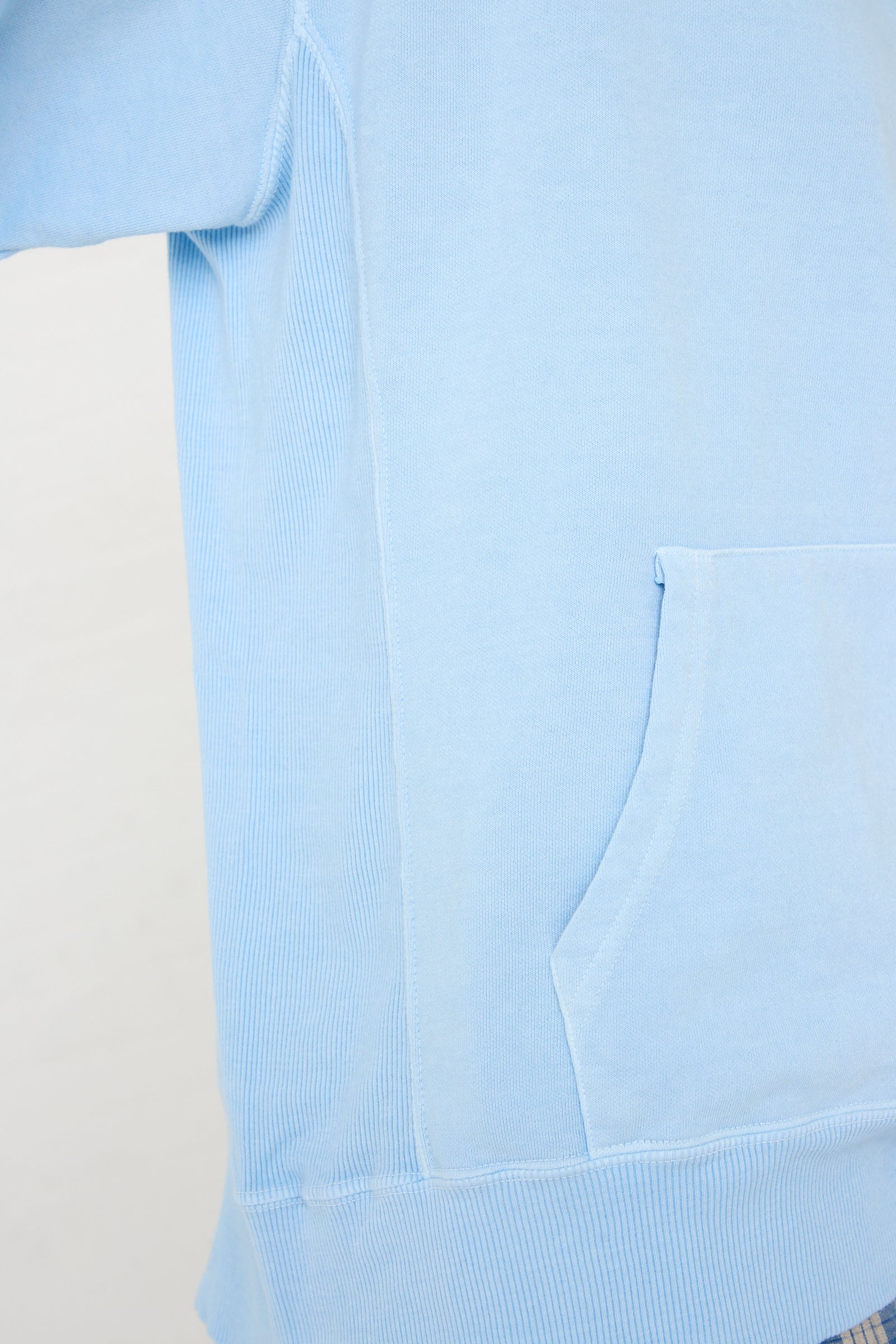 Detail of a French Terry Hoodie in Blue by Ichi Antiquités with a pocket.