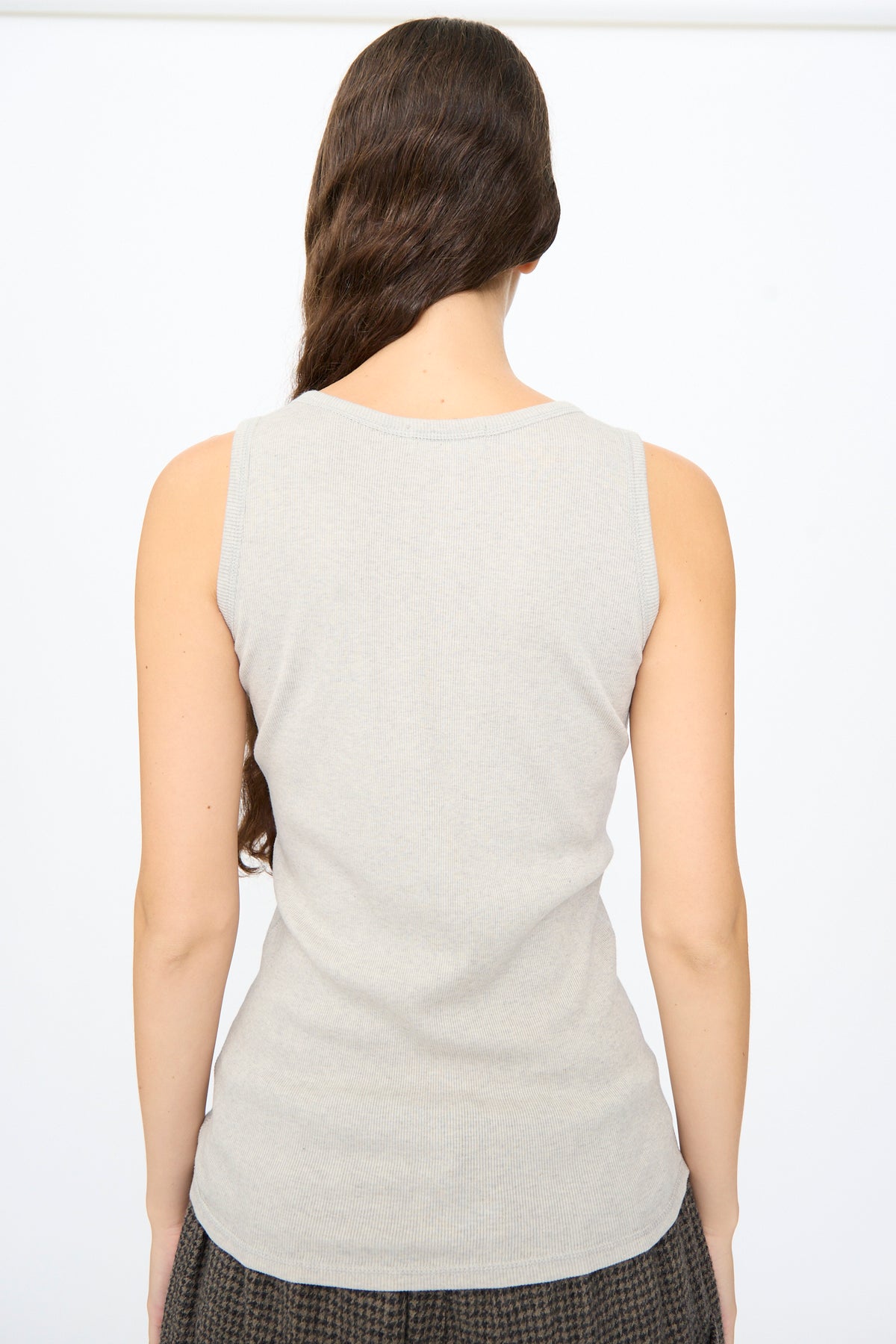 Back view of a person wearing an Ichi Antiquités Rib Tank Top in Gray, a light gray ribbed cotton tank top.