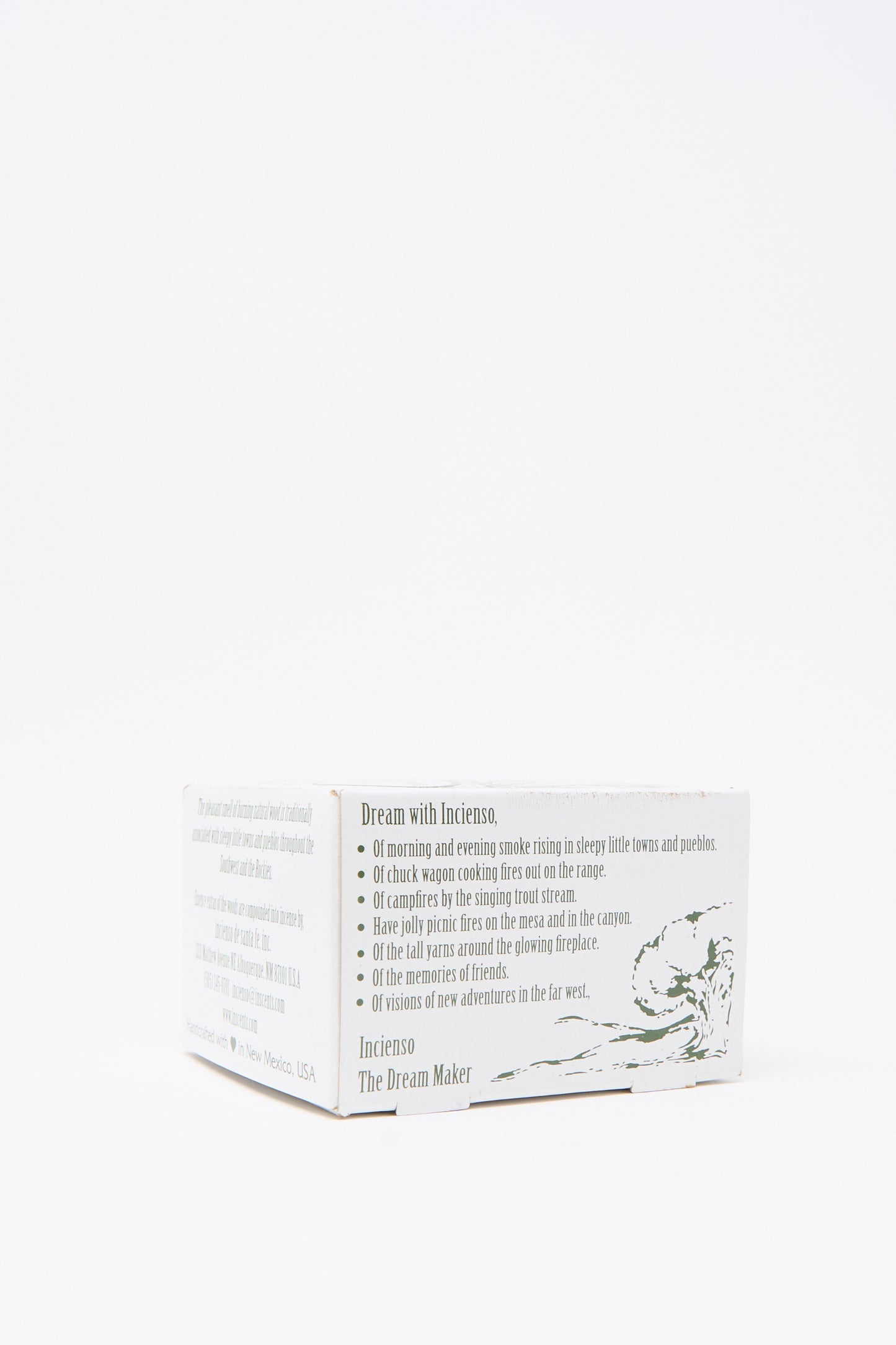 A white "Fir Balsam Incense Box" by Incense of the West features printed details and a simple mountain and tree illustration, evoking the fresh scent of balsam fir in an evergreen forest. Perfect for pairing with your favorite incense burners.