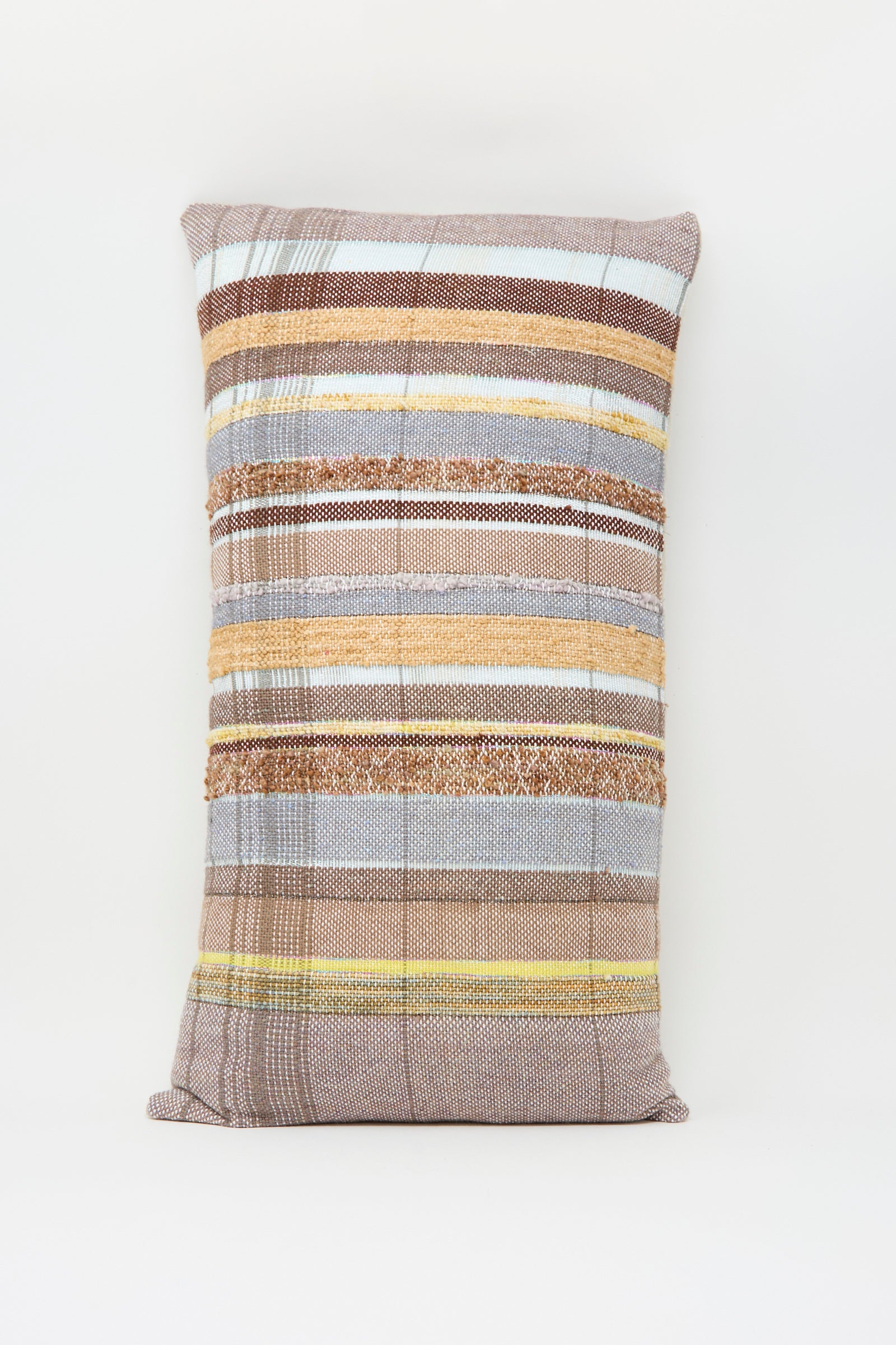 The Jess Feury Woven Pillow in Blue, Rust and Yellow Stripe is a rectangular, handwoven accent featuring horizontal stripes, handmade in California and shown on a white background.