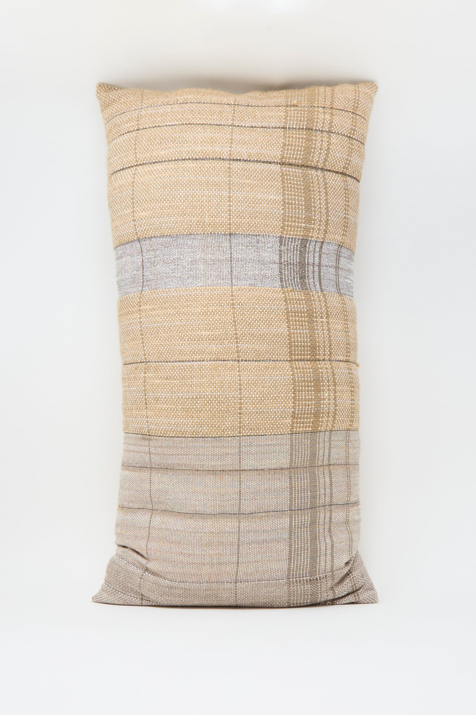 The Jess Feury Woven Pillow in Blush and Silver, handmade in California, is shown upright against a plain white background.