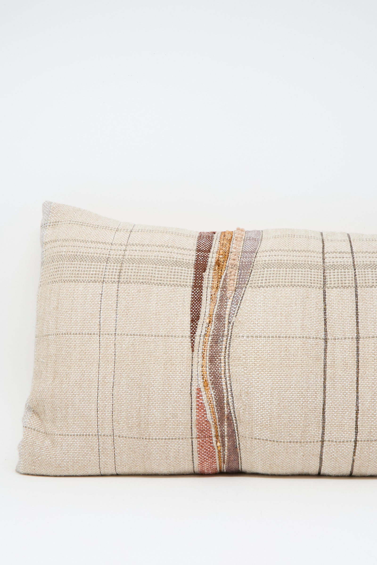 The Jess Feury Woven Pillow in Taupe and Multi features a handwoven plaid design with vertical brown, red, and orange stripes, handmade in California and shown on a plain white background.