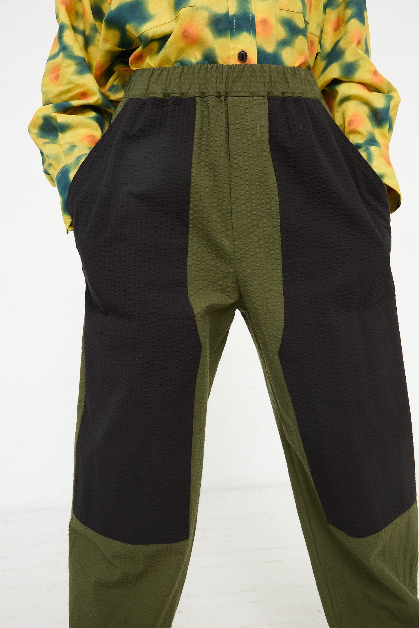 Two-tone KasMaria cotton seersucker work pants with an elastic waistband, displayed without the upper body visible.