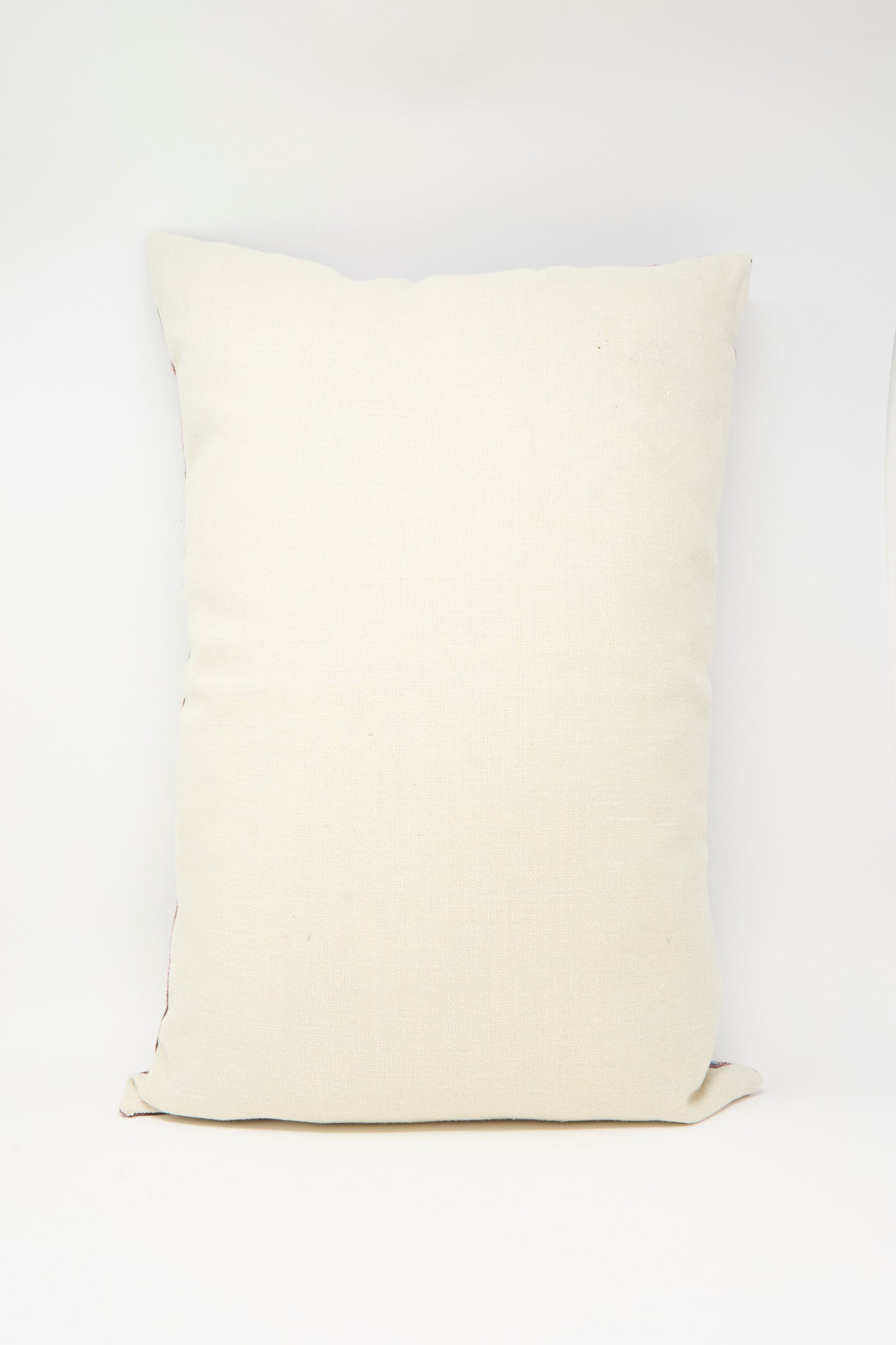 The Kissweh Imm Bushra Hand Embroidered Pillow in Chocolate, rectangular in shape, is displayed against a white background.