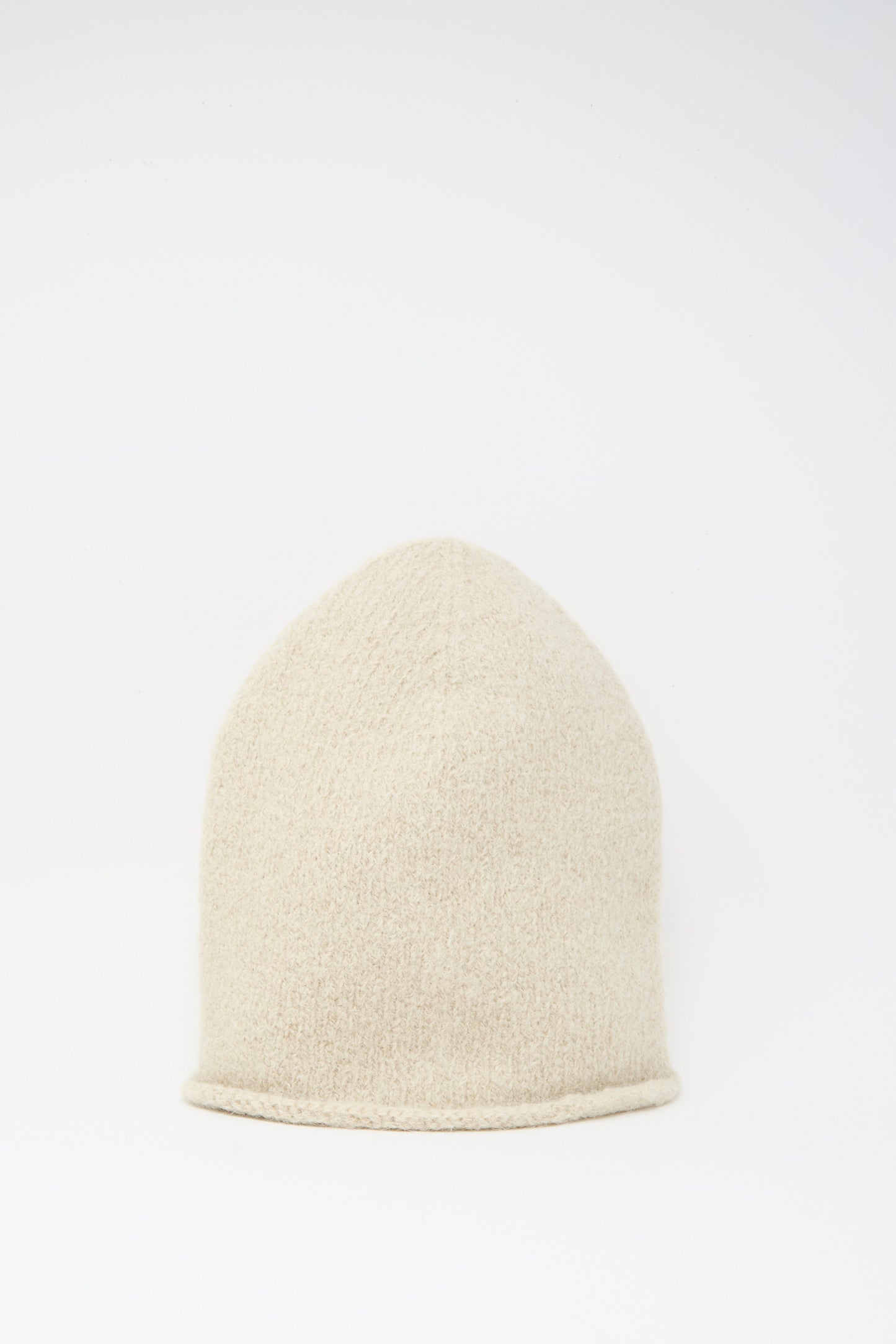 The Lauren Manoogian Crown Beanie in Antique Melange is shown against a white background, showcasing the classic simplicity of this hand-loomed knit accessory.
