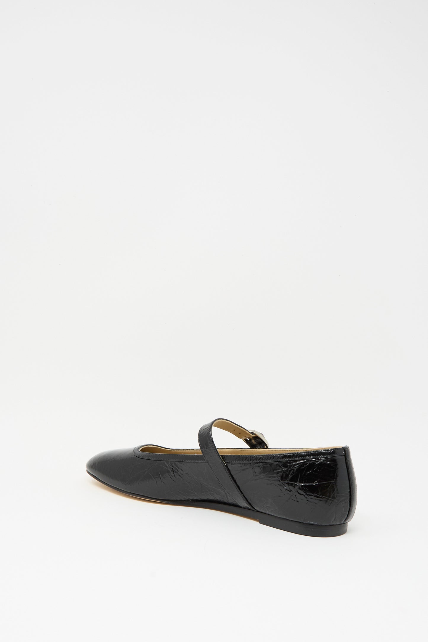 The Ballet Mary Jane in Black by Le Monde Beryl is a single glossy lambskin flat with a strap, shown against a plain white background.
