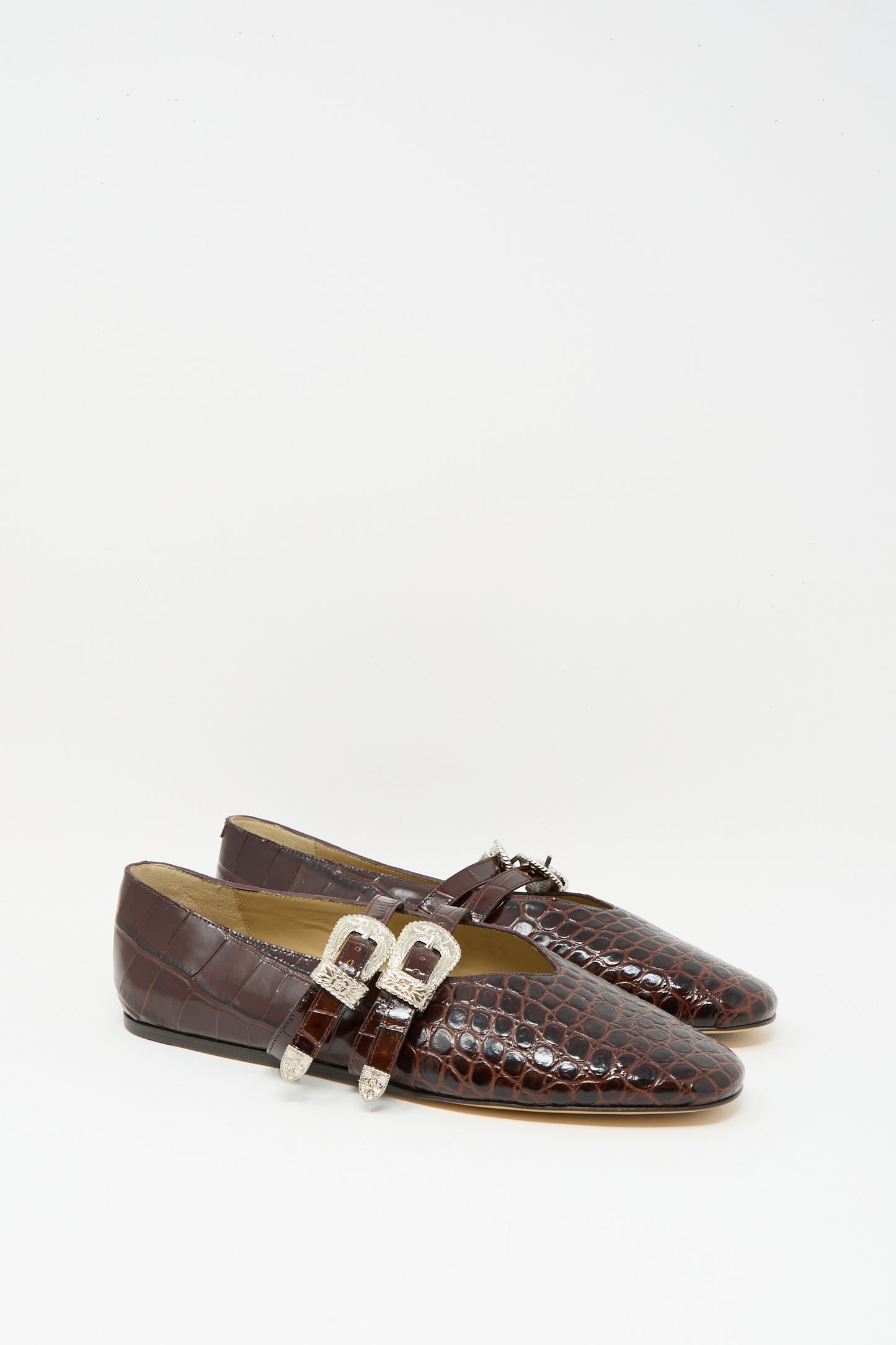 The Claudia Slipper in Coco Brown by Le Monde Beryl features a crocodile-pattern calf leather design with silver buckle details, shown on a plain white background.