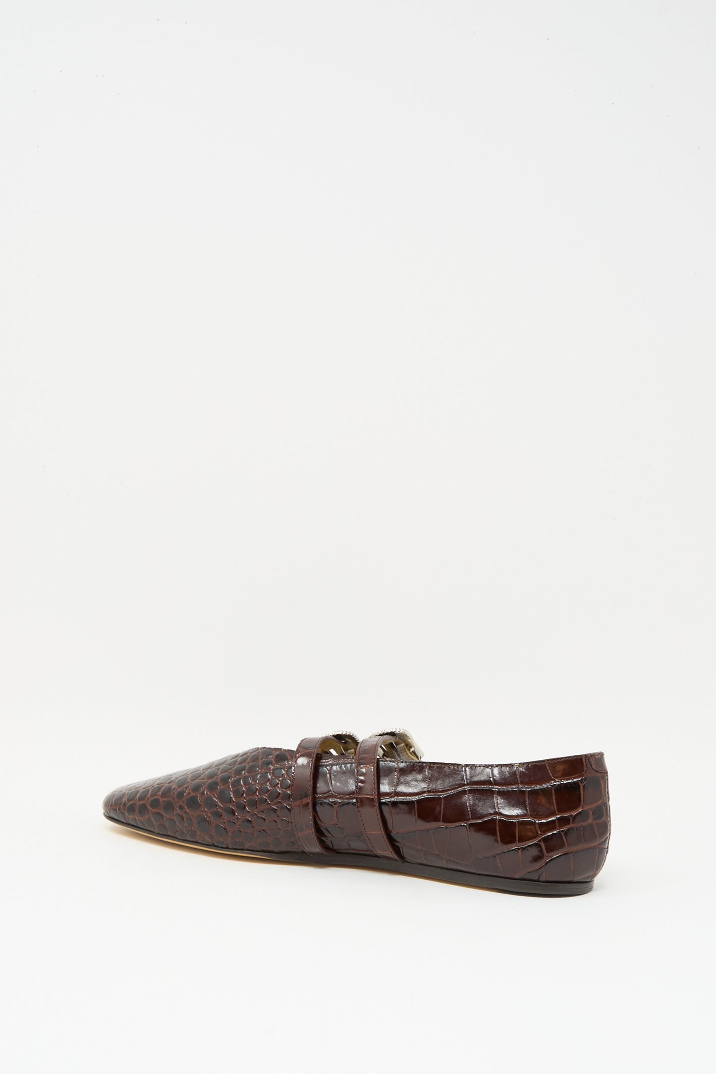 The Claudia Slipper in Coco Brown by Le Monde Beryl, crafted from crocodile-patterned calf leather with a pointed toe, appears against a plain white background.