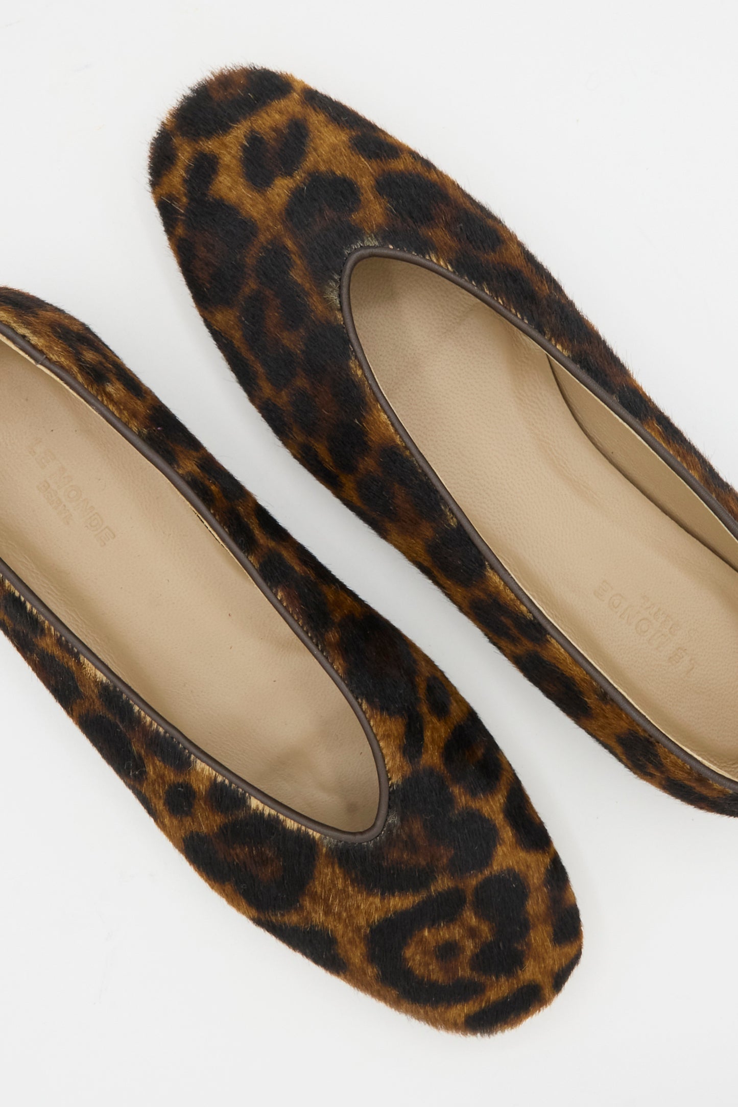 The Le Monde Beryl Regency Slipper in Leopard features women's calf hair with a brown and black leopard print, displayed from above on a white background.
