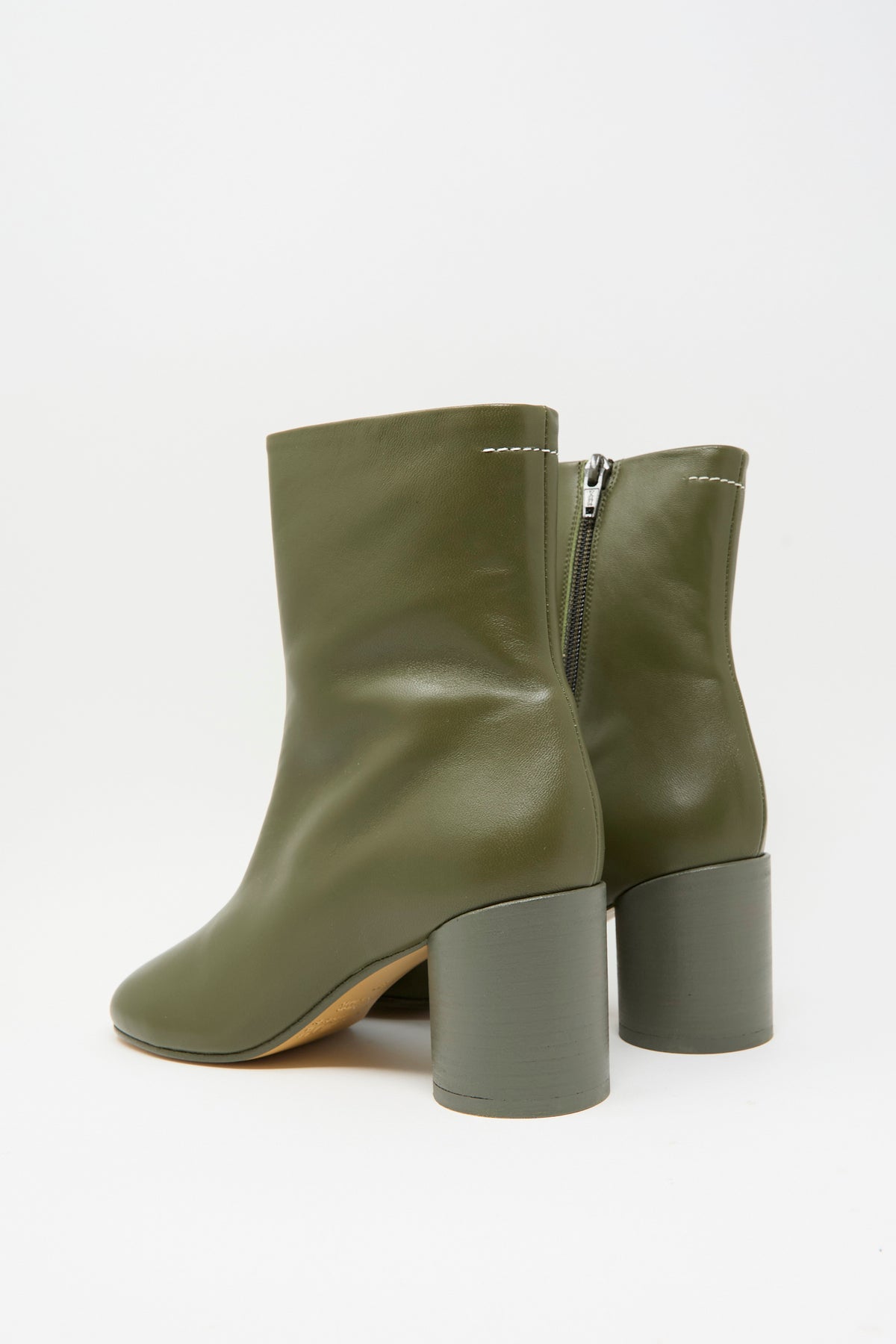 MM6 Ankle Boot in Beech: olive green calfskin leather ankle boots with a back zipper and a thick cylindrical heel.