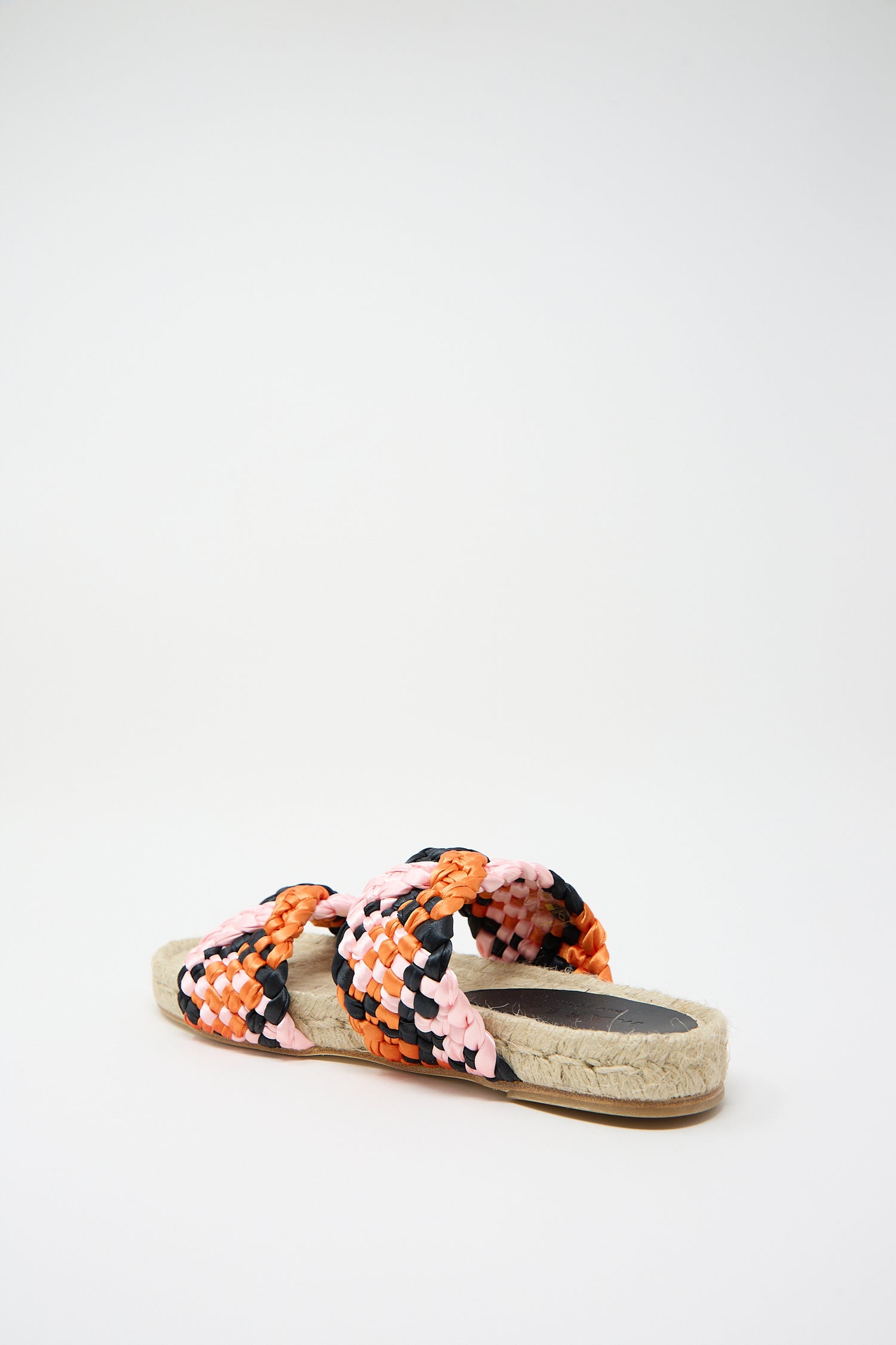 A pair of colorful handmade Marea Braided Satin Espadrille sandals with a white sole, displayed against a plain, light background.