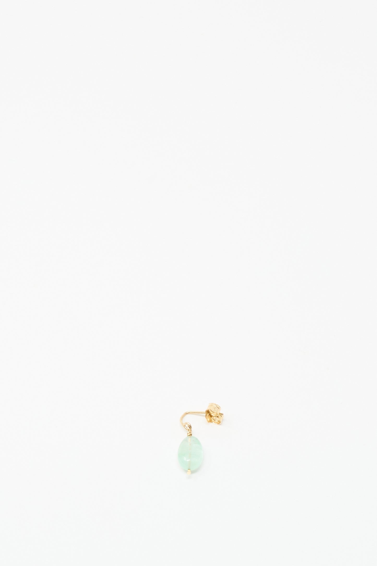 The Mary MacGill 14K Crescent Charm Single Earring features a small green aquamarine stone set in 14k gold, shown centered on a white background.