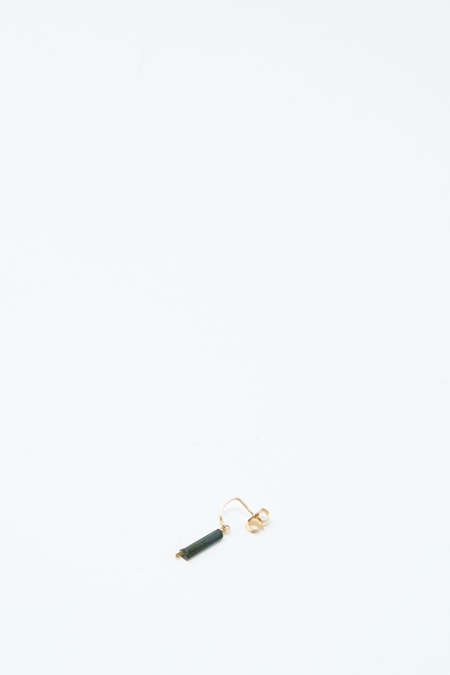 The Mary MacGill 14K Crescent Charm Single Earring features a dark tourmaline tube pendant and is shown alone on a plain white background.