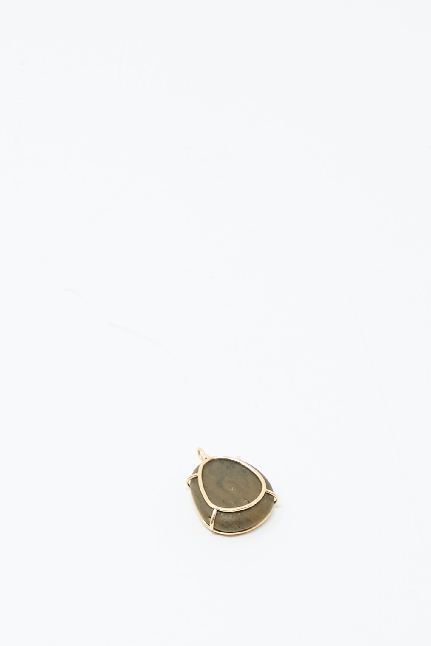 The Mary MacGill 14K Floating Pendant in Island Stone features a teardrop-shaped dark stone framed in gold metal, displayed on a plain white background.