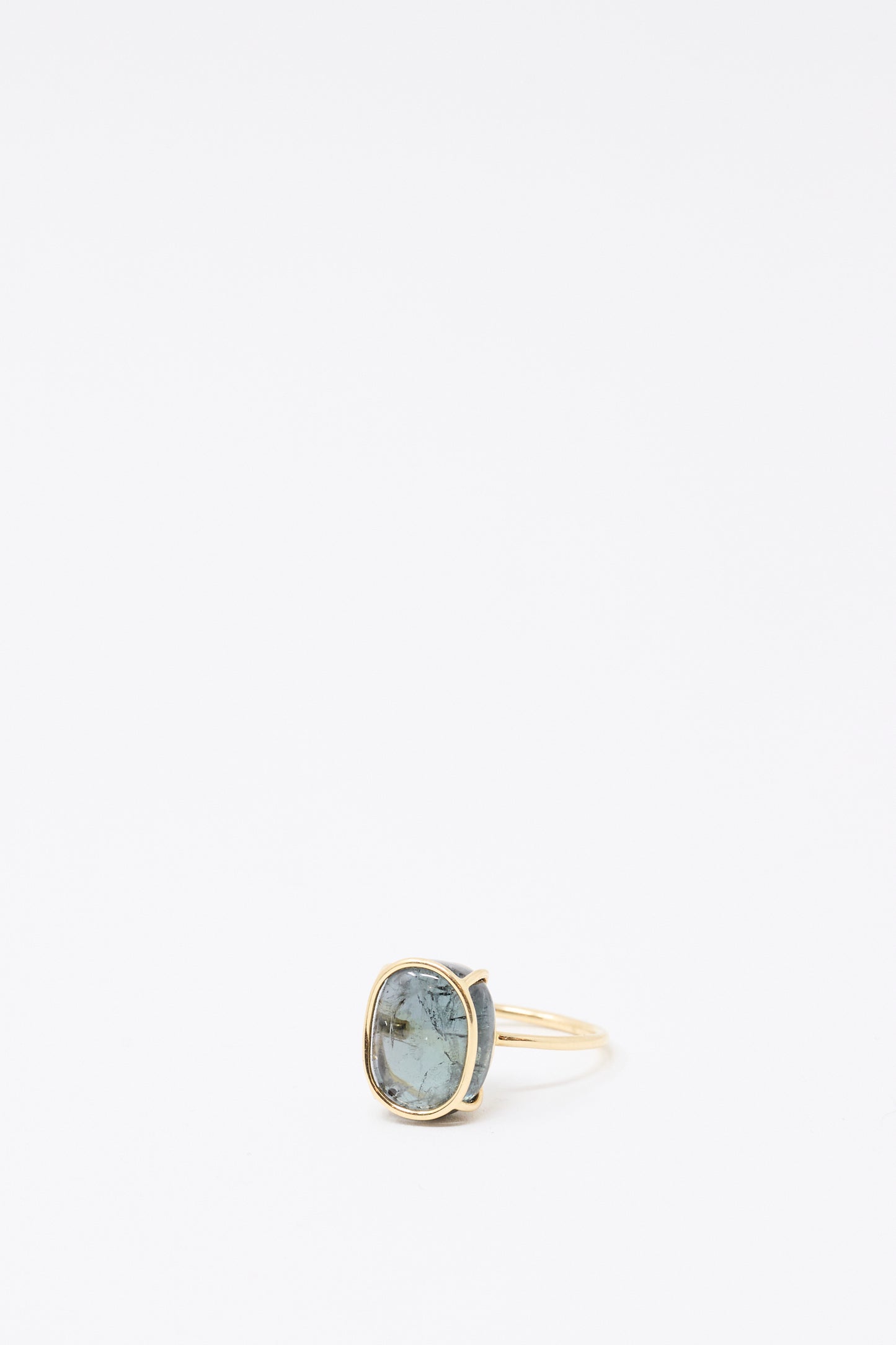 The Mary MacGill 14K Floating Ring features a handmade design with a green tourmaline gemstone set in the center, shown against a plain white background.