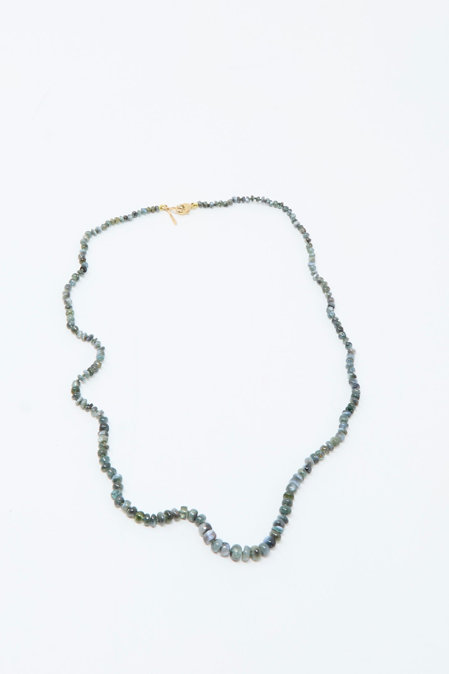 The Mary MacGill 14K Stone Layering Necklace in Cat's Eye 18" features small, round, greenish-blue beads and a 14k gold clasp, displayed on a plain white background.