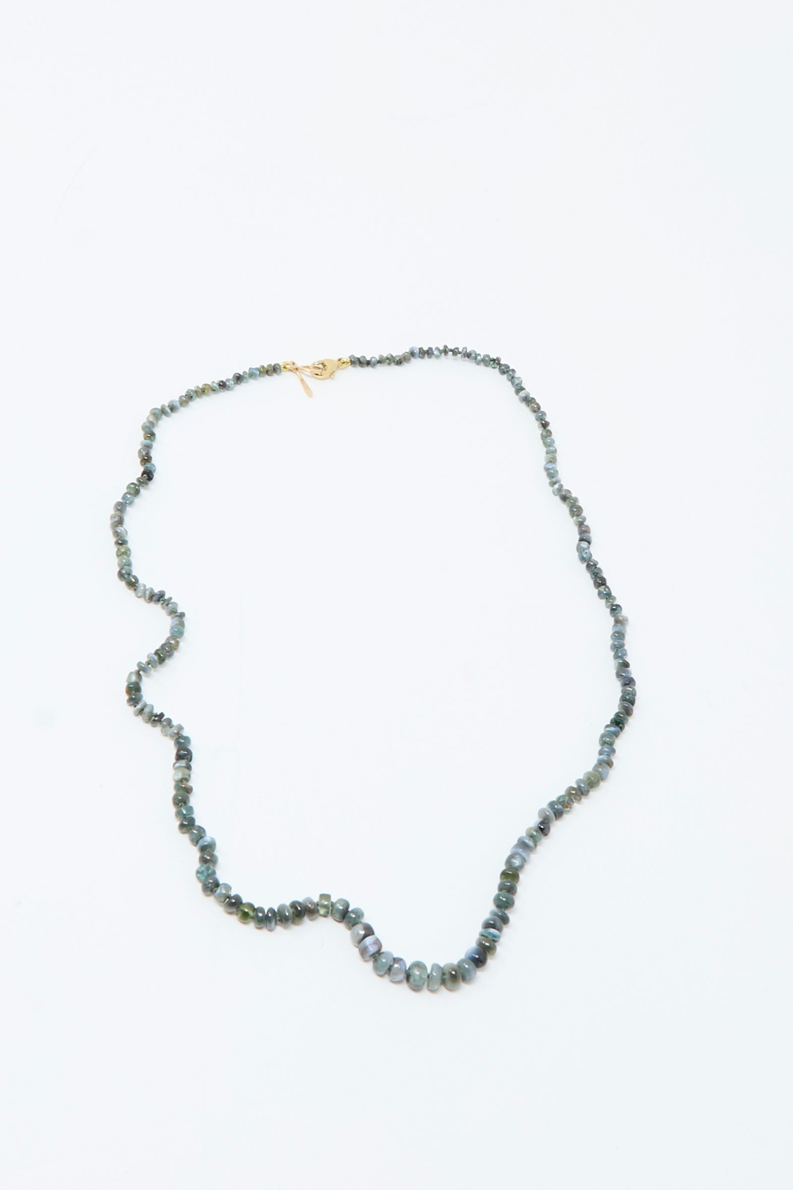The Mary MacGill 14K Stone Layering Necklace in Cat's Eye 18" features small, round, greenish-blue beads and a 14k gold clasp, displayed on a plain white background.