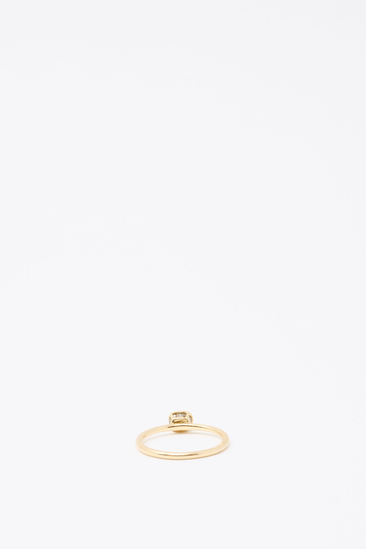 The Mary MacGill 14K Floating Ring in Cognac Rose Cut Mineral Diamond, a handmade piece, features a small square diamond and is centered at the bottom of a white background.