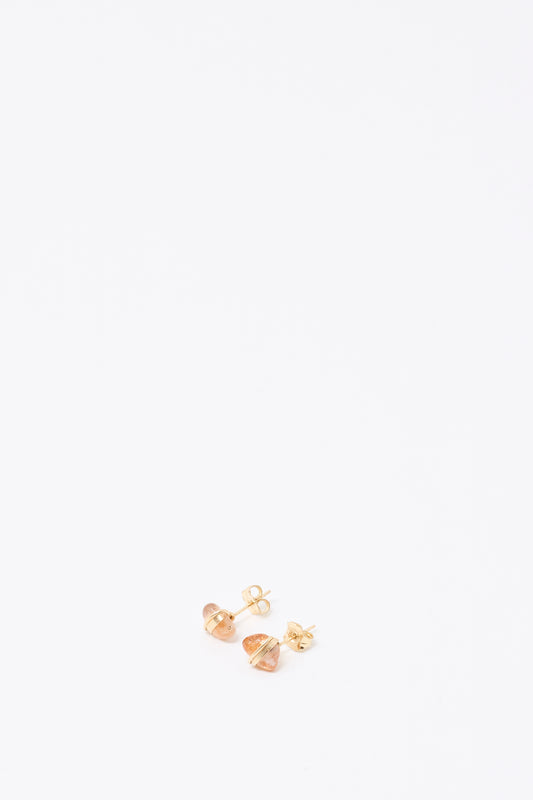 A pair of Mary MacGill Stone Studs in Sunstone with a geometric design is displayed on a plain white background.
