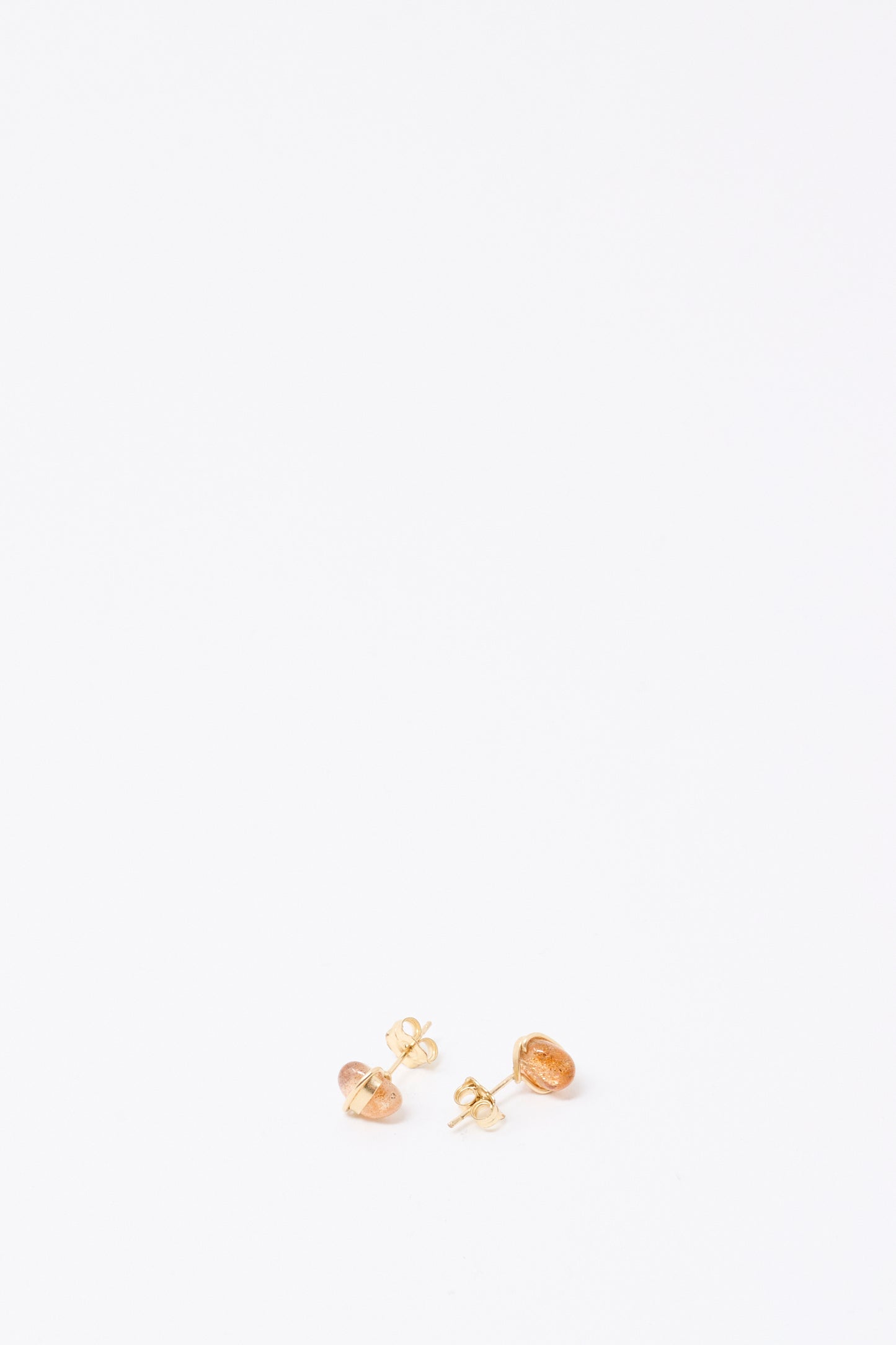 A pair of Mary MacGill Stone Studs in Sunstone, crafted from gold-filled wire, shown on a plain white background.