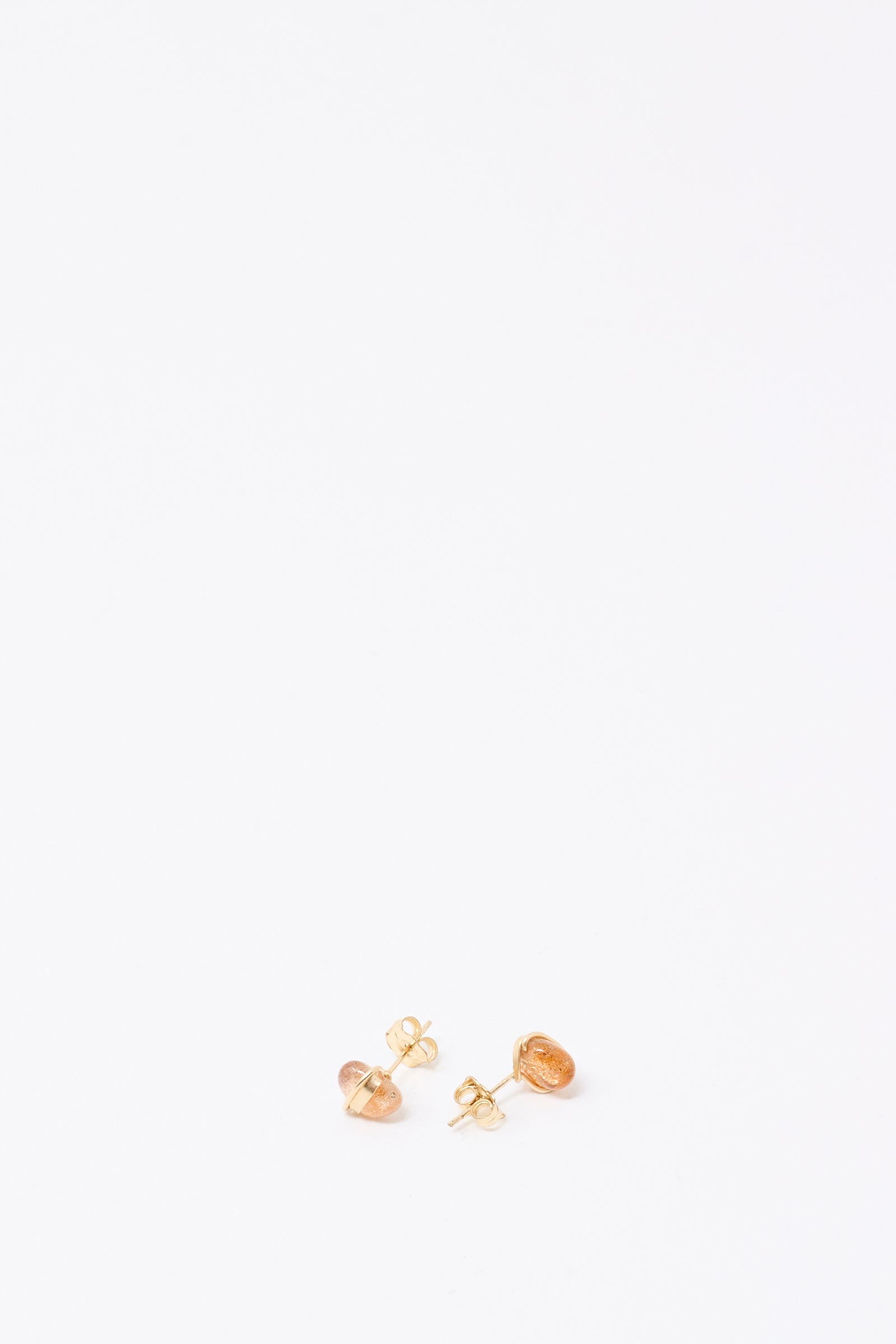 A pair of Mary MacGill Stone Studs in Sunstone, crafted from gold-filled wire, shown on a plain white background.