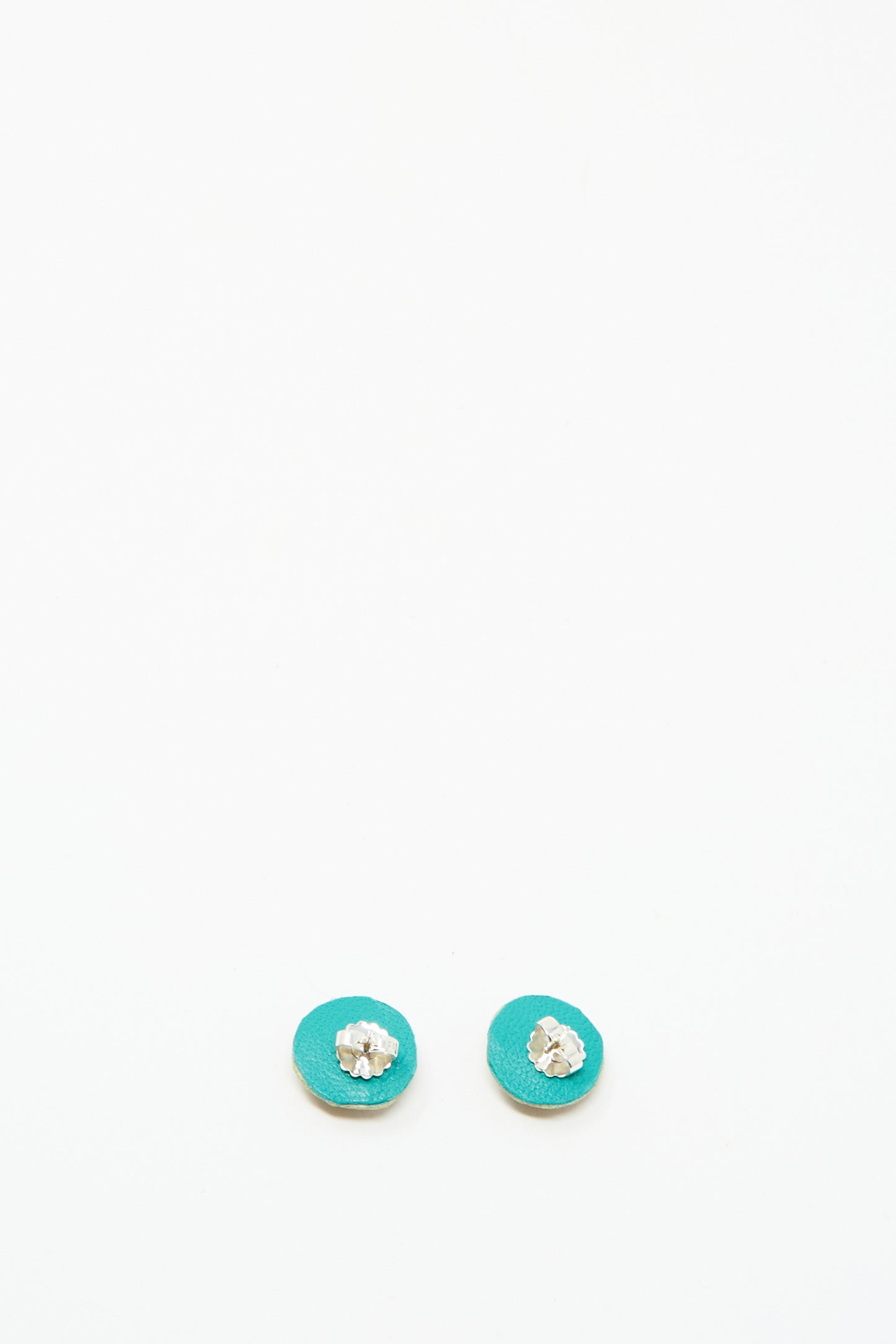 A pair of small round red jasper Stud Earrings by Robin Mollicone, featuring handmade sterling silver flower-shaped studs, displayed on a plain white background.
