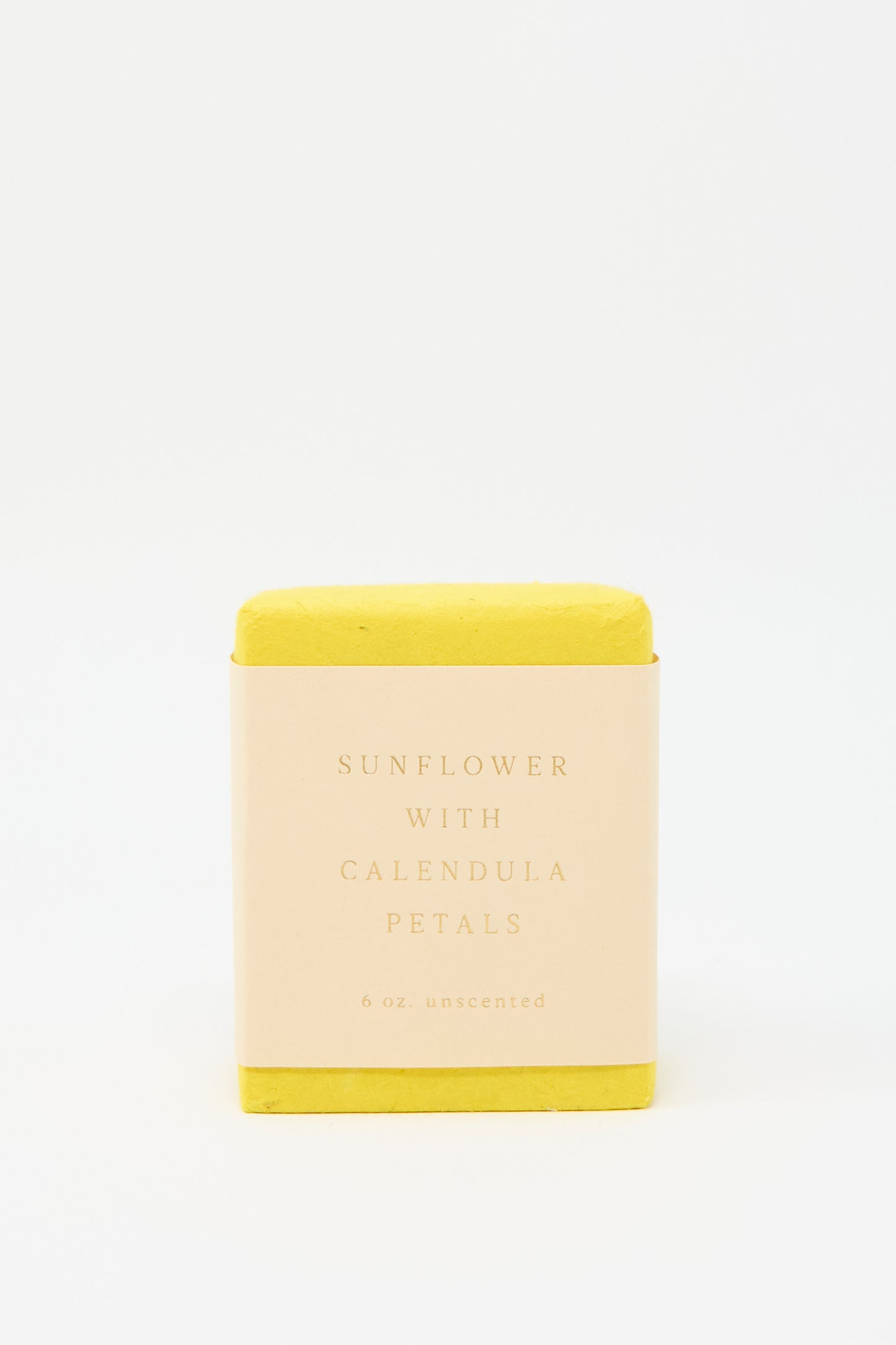 A yellow bar of unscented soap labeled "Olive Oil Bar Soap in Sunflower with Calendula Petals, 6 oz." by SAIPUA, set against a white background, emphasizing its handcrafted and moisturizing qualities.