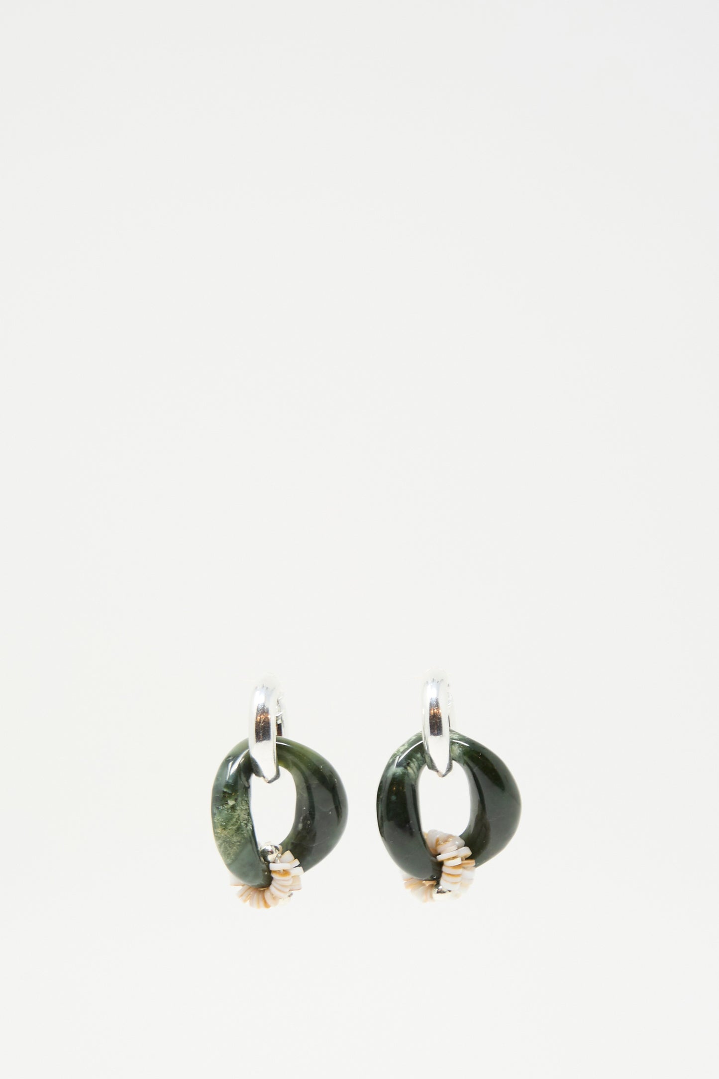 The Santangelo Bad Orb Earrings in Jade feature dark green jade oval hoops with small gold-toned accents, displayed against a plain white background.