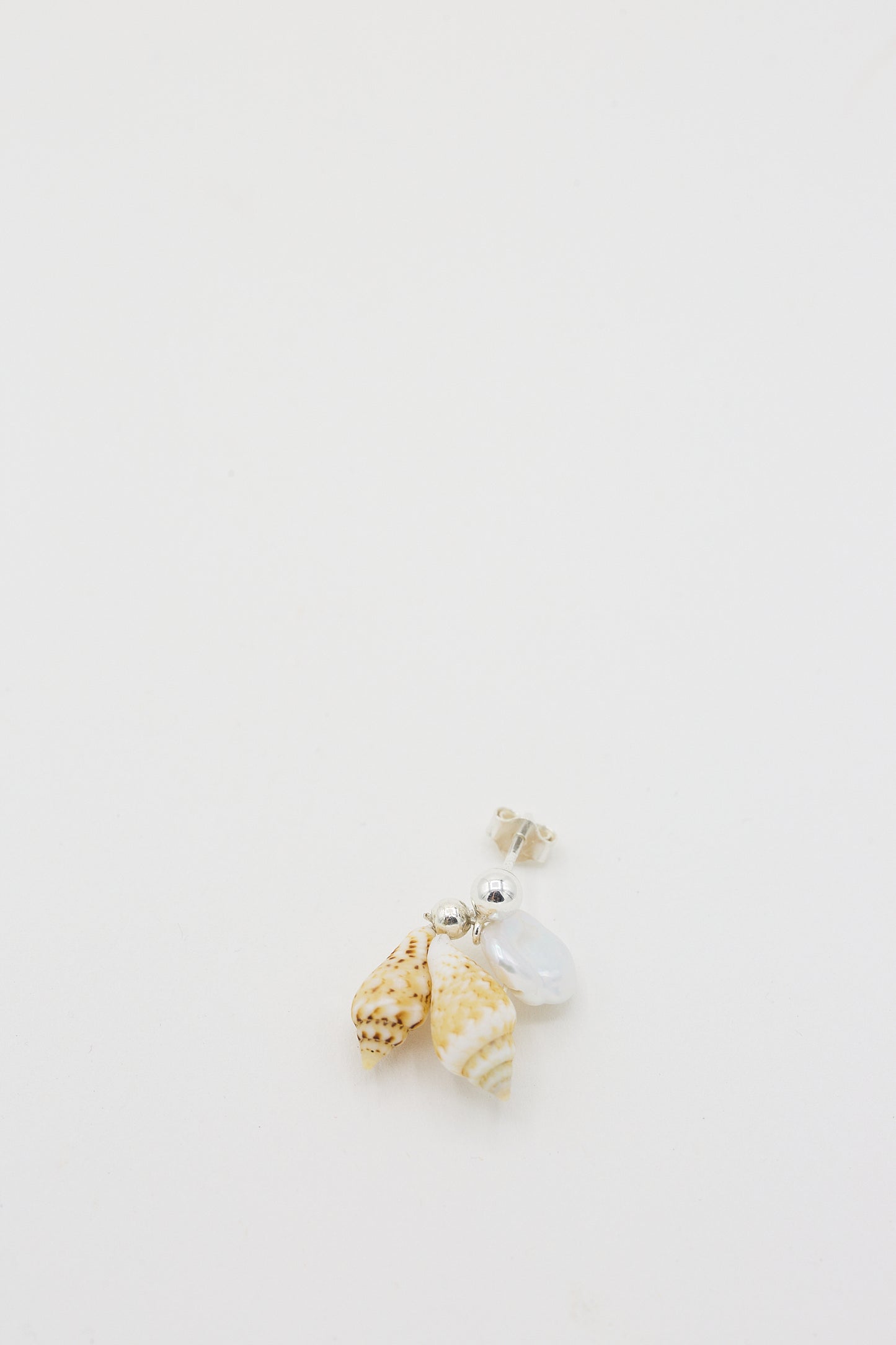 A single Santangelo Double Shell Bebecita earrings with keshi pearl accents on a white background.