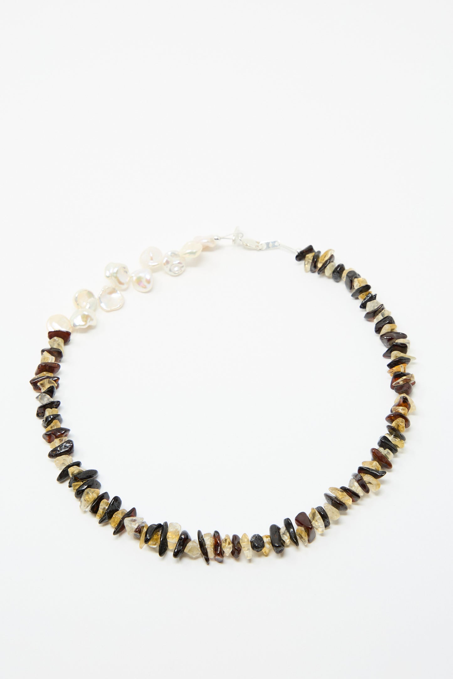 The Santangelo La Duke Necklace in Citrine and Amber Stripe features alternating irregular brown and beige stone beads with a section of freshwater keshi pearls, shown against a white background.