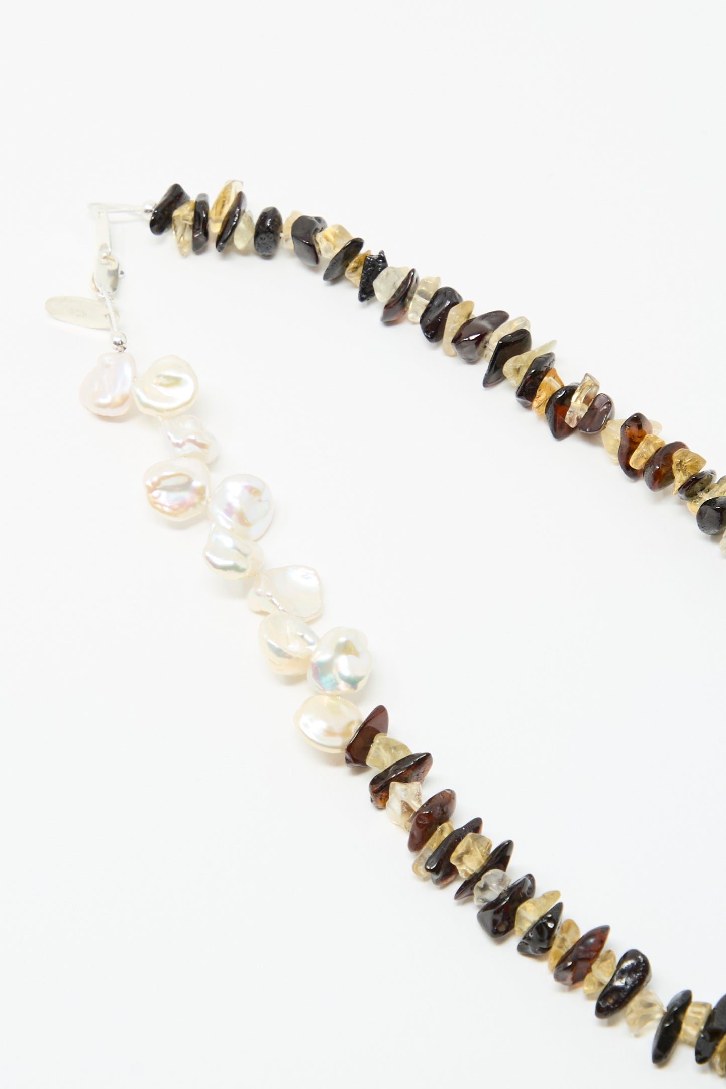 The Santangelo La Duke Necklace in Citrine and Amber Stripe features half irregular Freshwater Keshi pearls and half brown and yellow citrine stone chips, displayed on a white background.