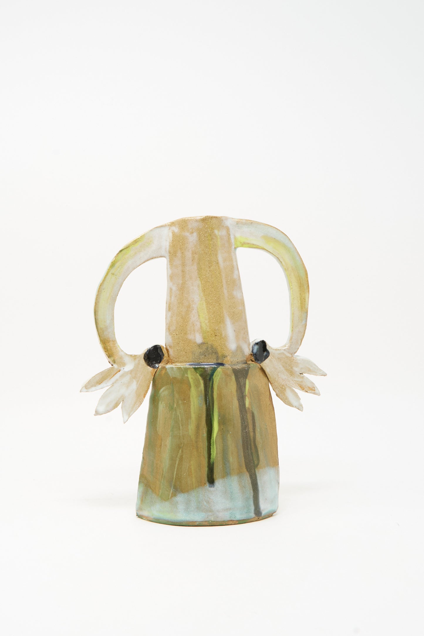 Introducing the "Two Cyclamens on Top of a Mountain Vase III" by Tamar Mogendorff—this handmade ceramic vase features two elegantly curved handles and an abstract design painted in earthy shades of green, beige, and blue. Accentuating its striking form, the vase is adorned with two black circular details near the base of each handle.