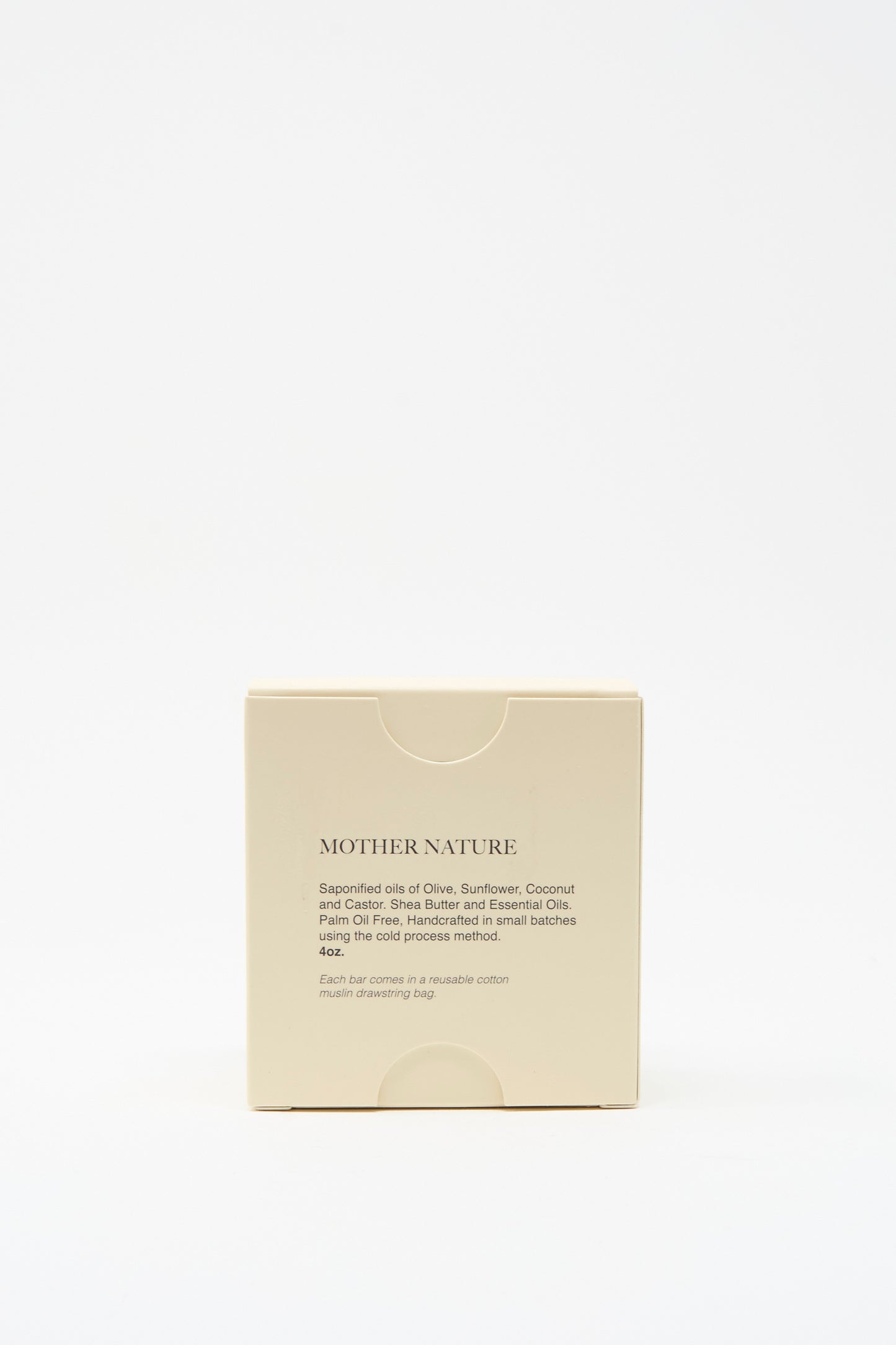 A beige box labeled "Mother Nature Wild Pistachio Soap Bar" by The Quiet Botanist, featuring vegan ingredients—olive, sunflower, coconut, and castor oils—sits centered on a white background; handmade in Turkey.