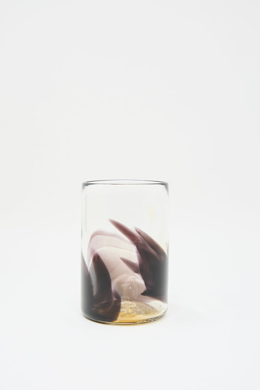 The Upstate Hand Dyed Fumé Glass features wisps of abstract color swirling inside, set against a plain white background.