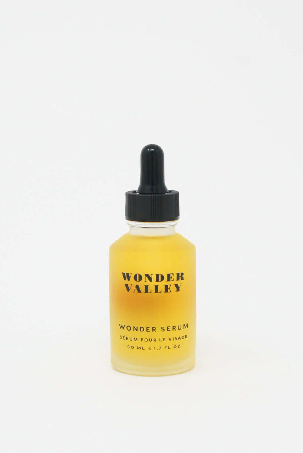A bottle of Wonder Serum, enriched with bioactive peptides and hyaluronic acid, showcased on a pristine white background.