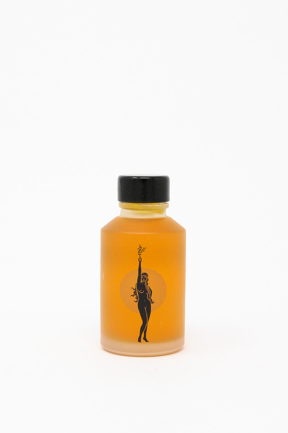 A revitalizing bottle of Wonder Valley Face Oil showcasing a woman's image - perfect for hydrating and reviving all skin types.