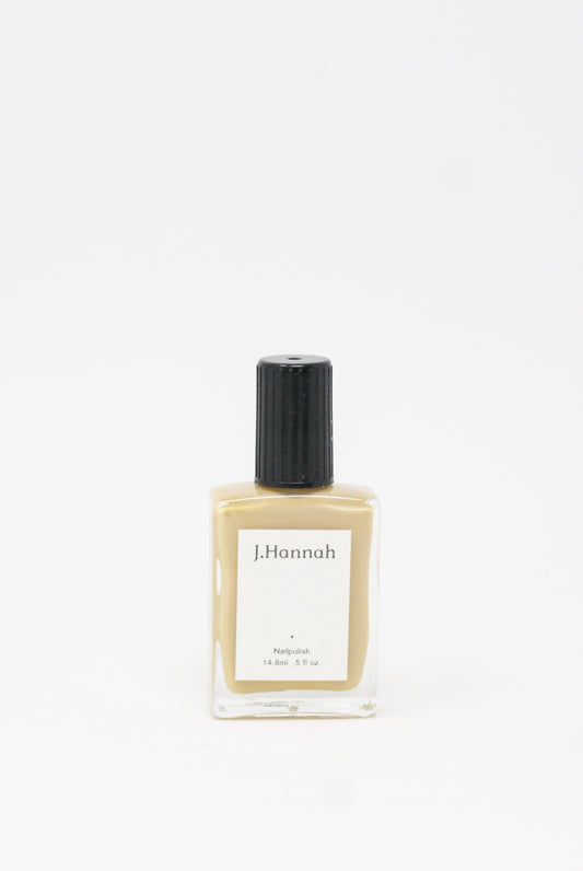 J Hannah Nail Polish in Relic (Color: Nude). Single bottle against a white background. 