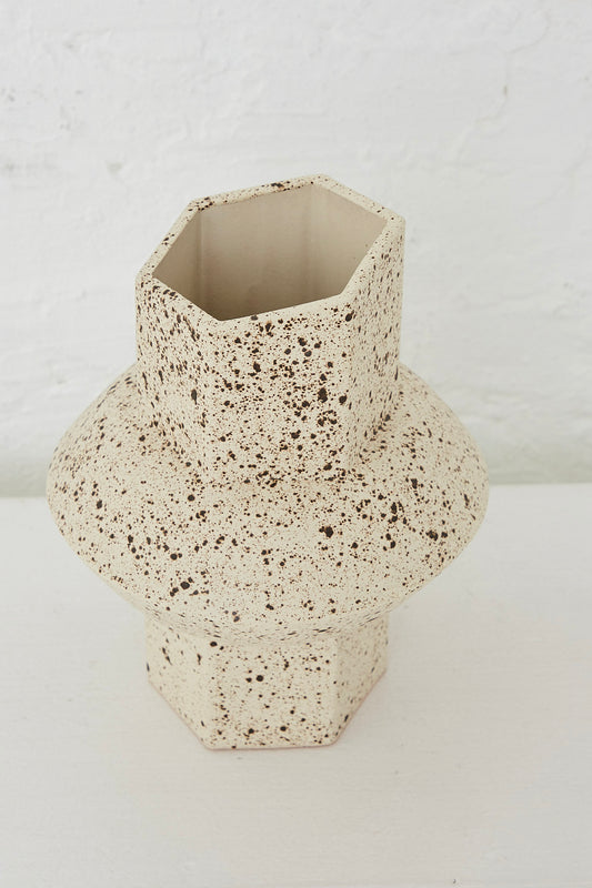 A Small Oval Vase in Birch by artist Bari Zipperstein with a speckled pattern.